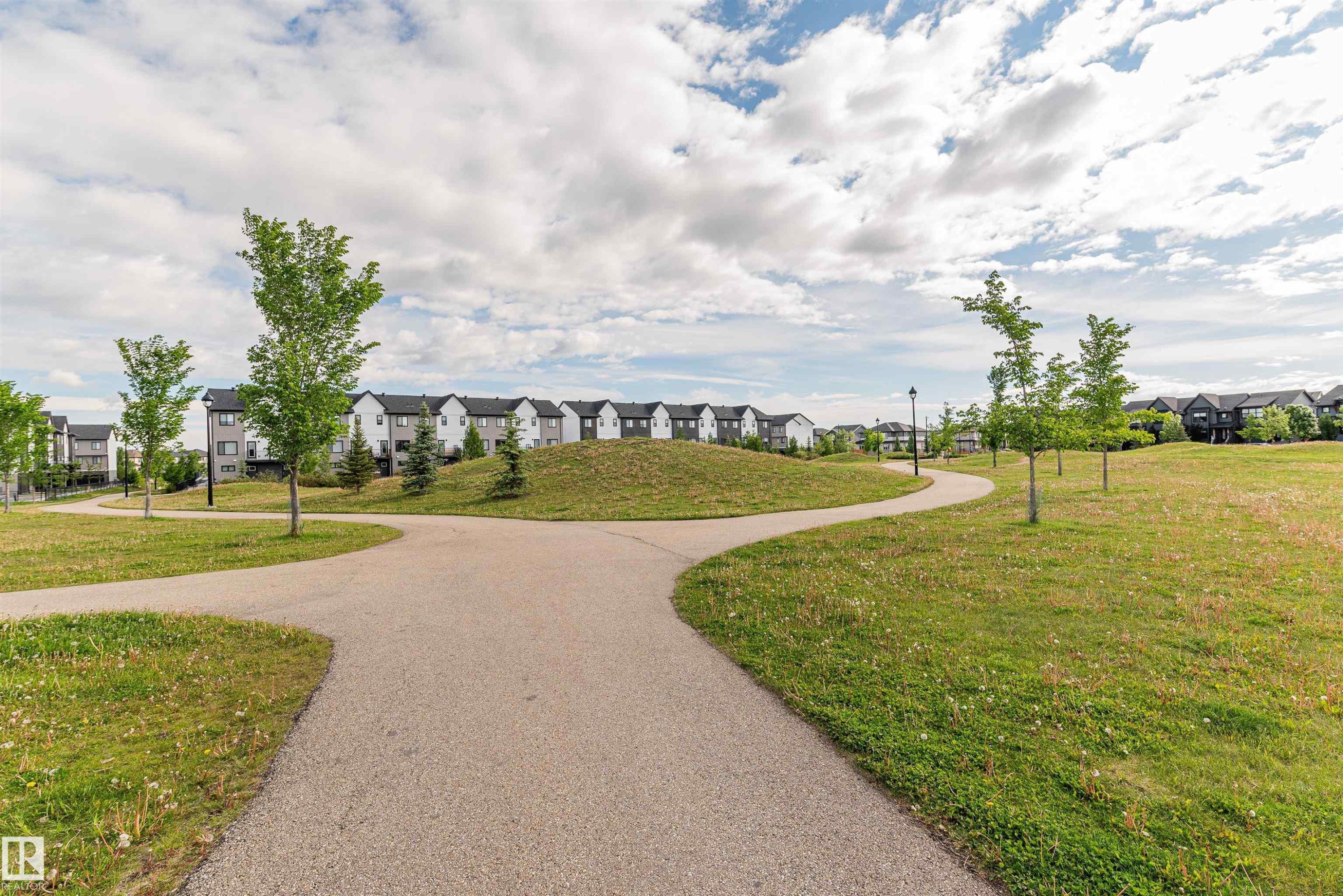 View of home's community featuring a residential view - 7322 Chivers Crescent, Edmonton, AB - Outdoor With View
