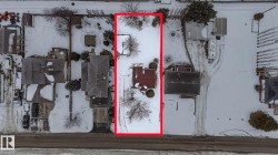 Aerial overview of property's location featuring property boundaries highlighted -