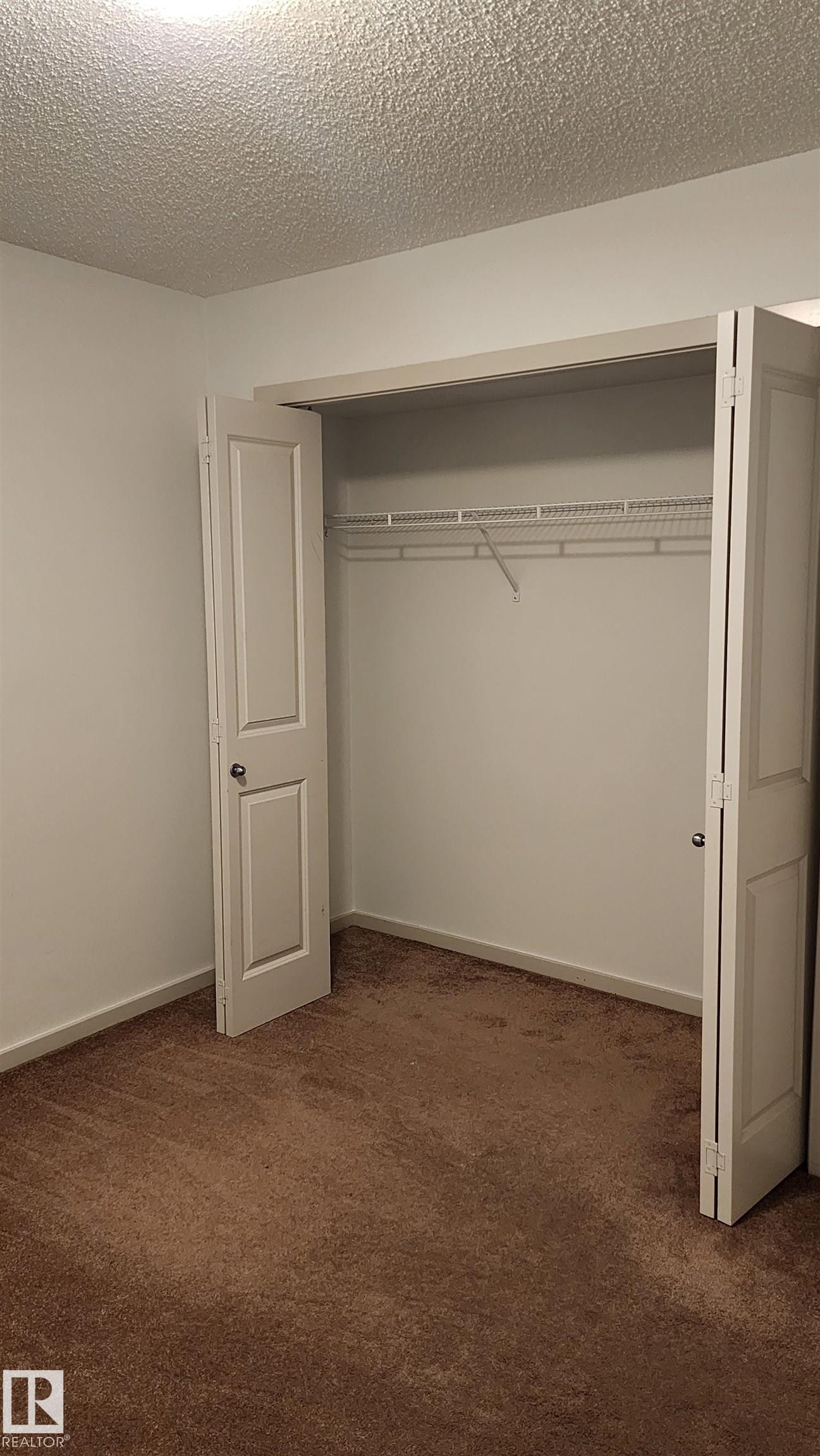 View of closet - 413 5521 7 Avenue, Edmonton, AB - Indoor Photo Showing Other Room