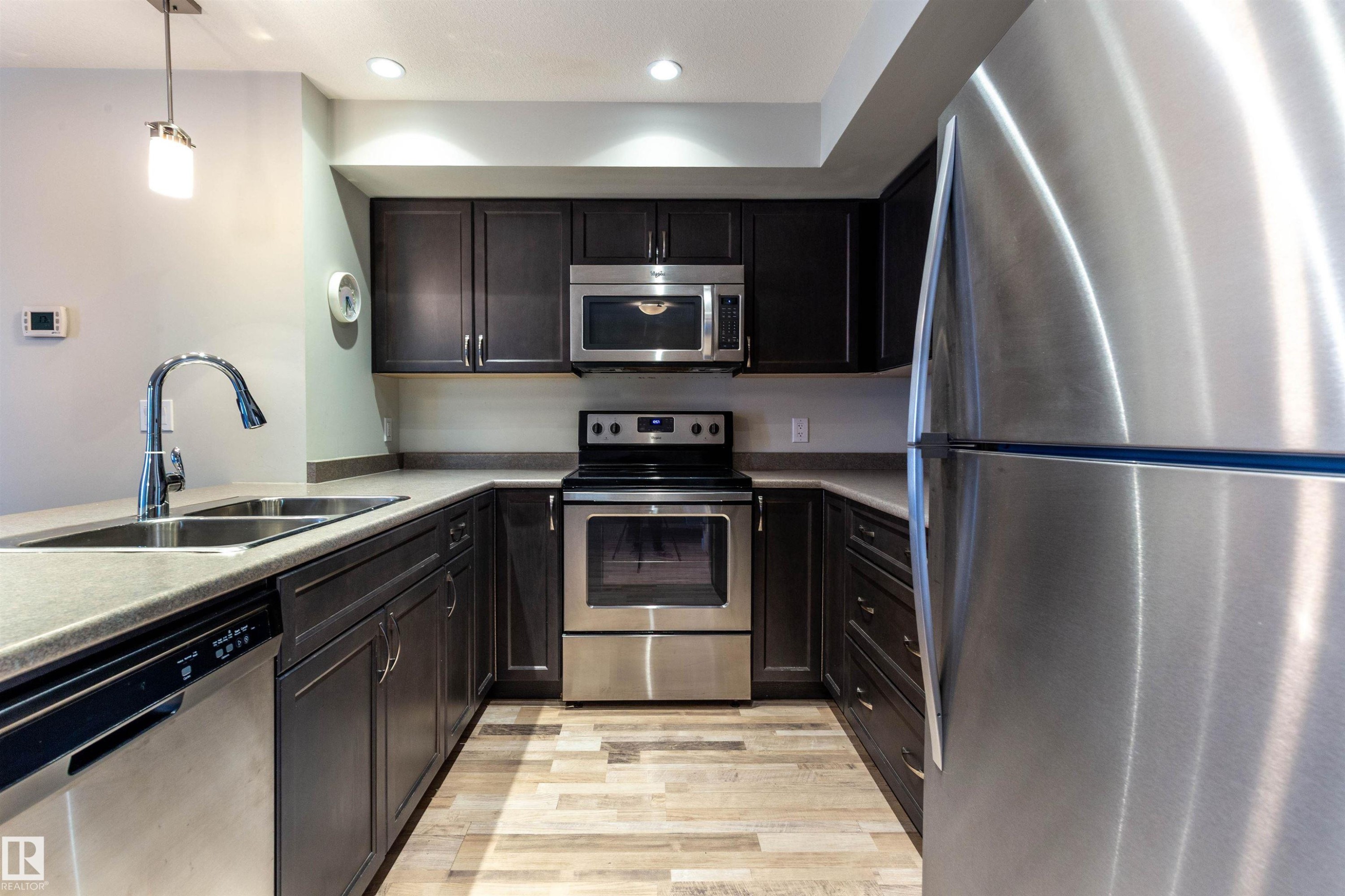 109 5029 Edgemont Boulevard, Edmonton, AB - Indoor Photo Showing Kitchen With Double Sink With Upgraded Kitchen