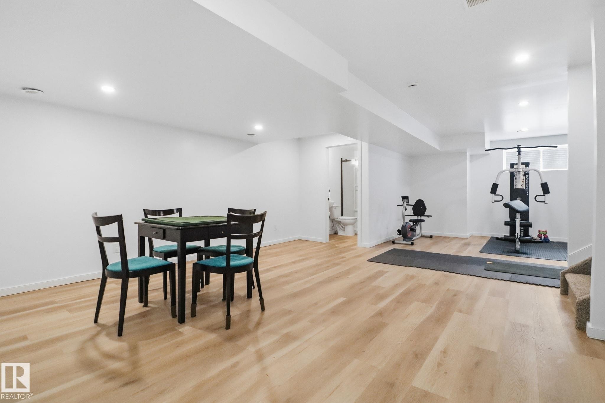 Dining room featuring light wood-type flooring and recessed lighting - 3234 Chernowski Way, Edmonton, AB - Indoor Photo Showing Gym Room