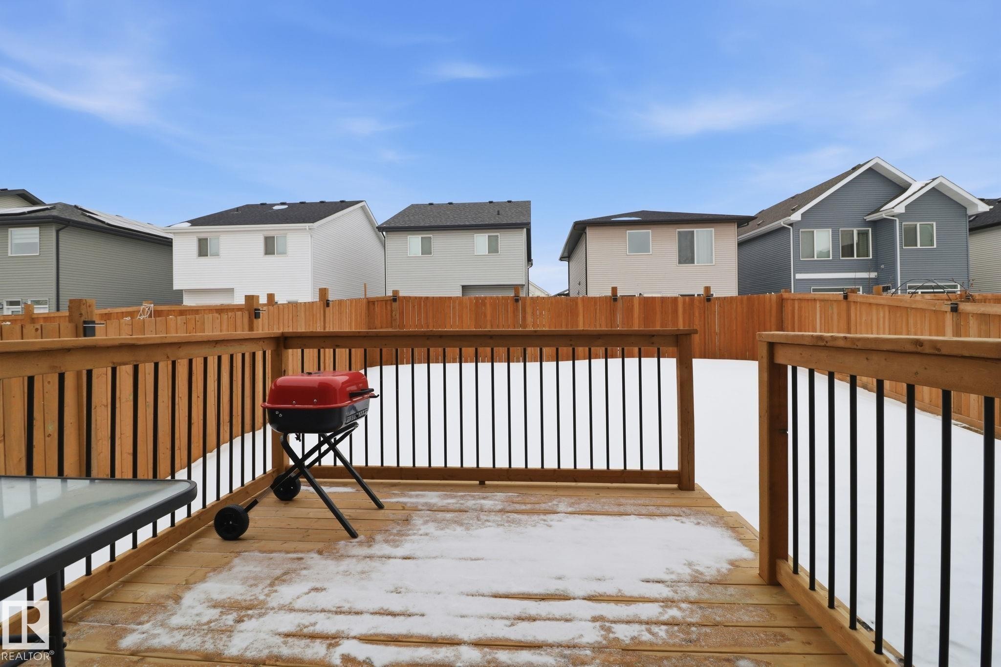 Deck featuring a residential view and grilling area - 3234 Chernowski Way, Edmonton, AB - Outdoor With Exterior