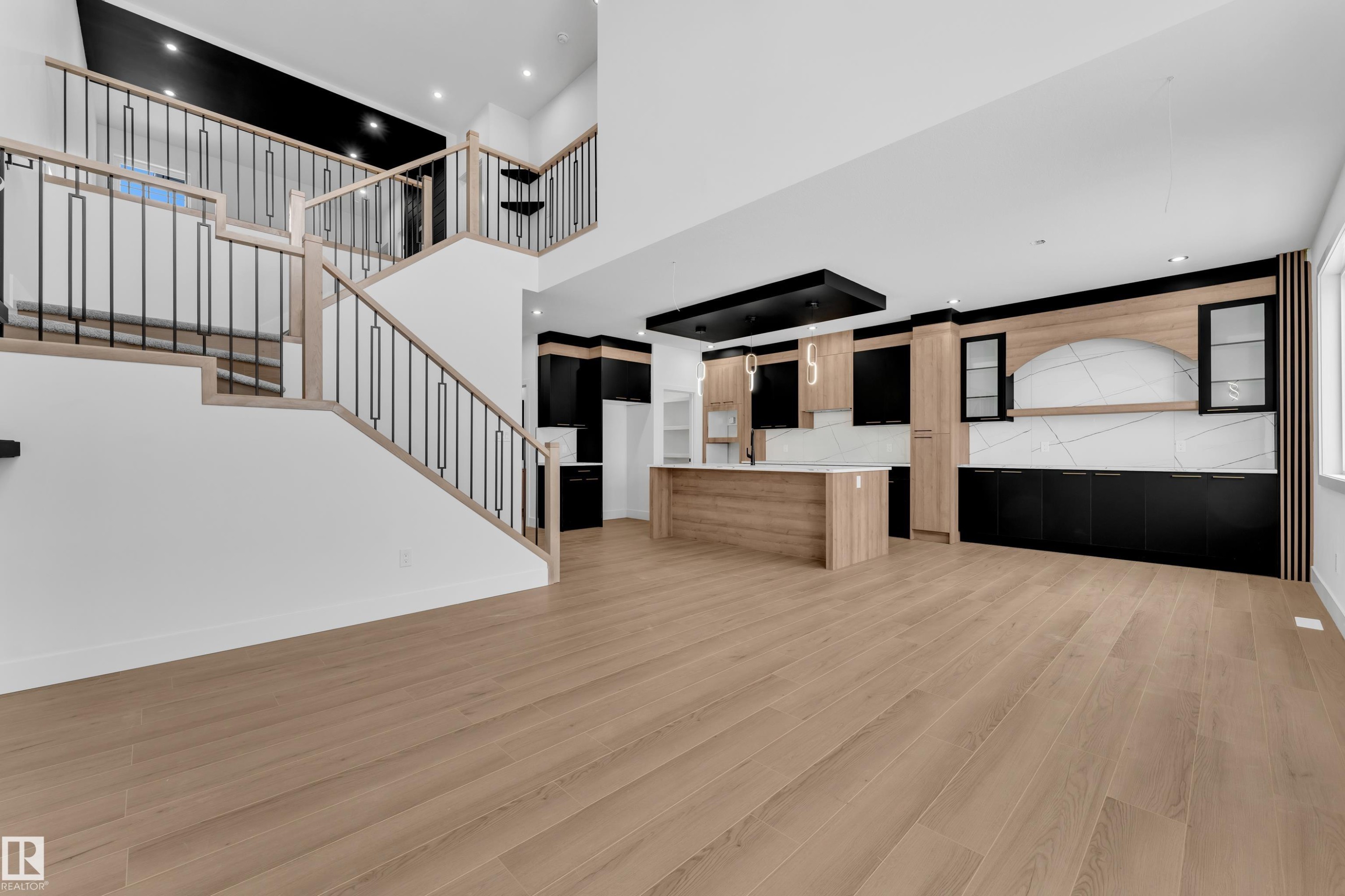 Unfurnished living room featuring recessed lighting and light wood-style floors - 741 Astoria Way, Devon, AB - Indoor Photo Showing Other Room