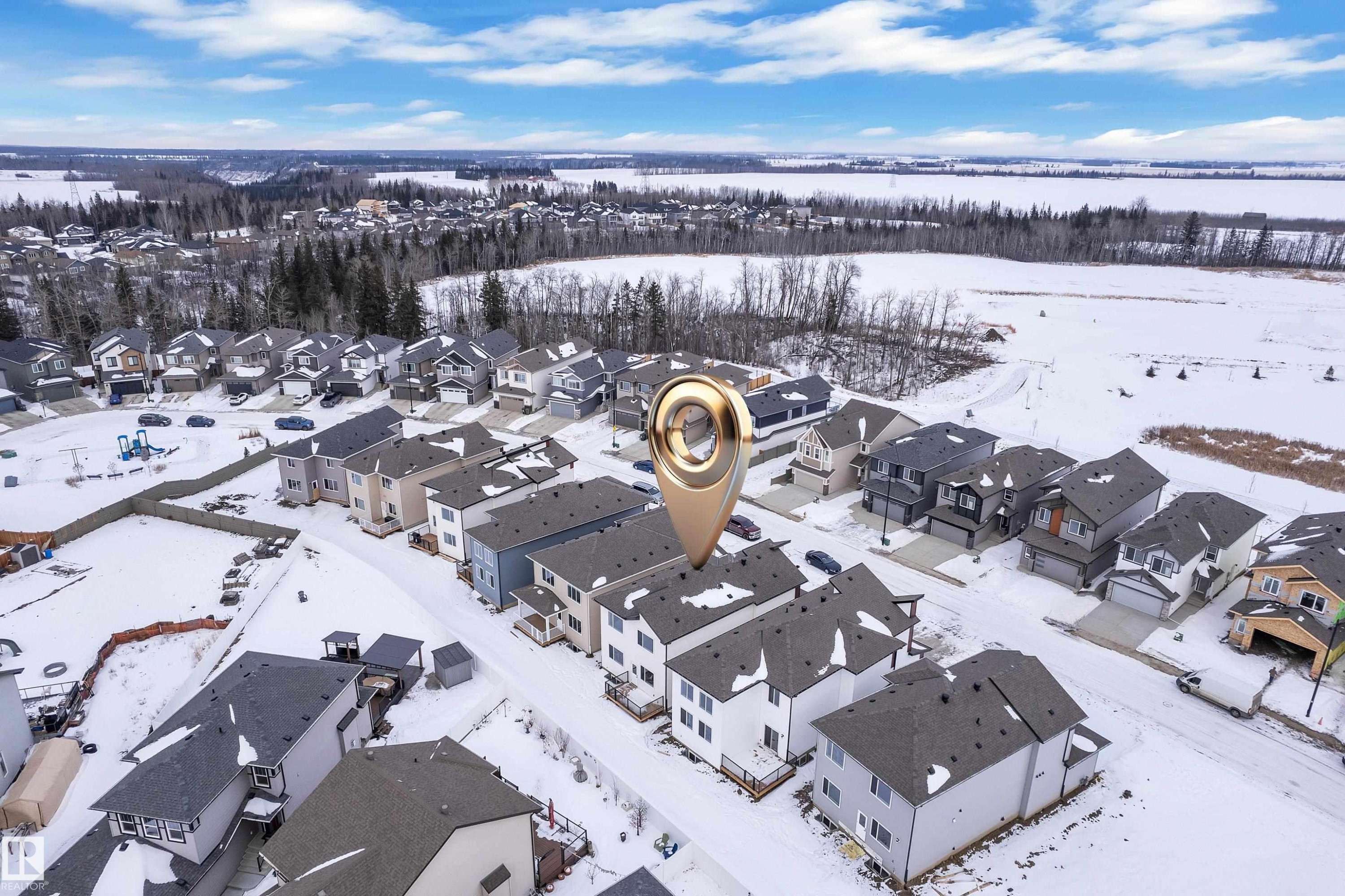 Snowy aerial view featuring a residential view - 741 Astoria Way, Devon, AB - Outdoor With View