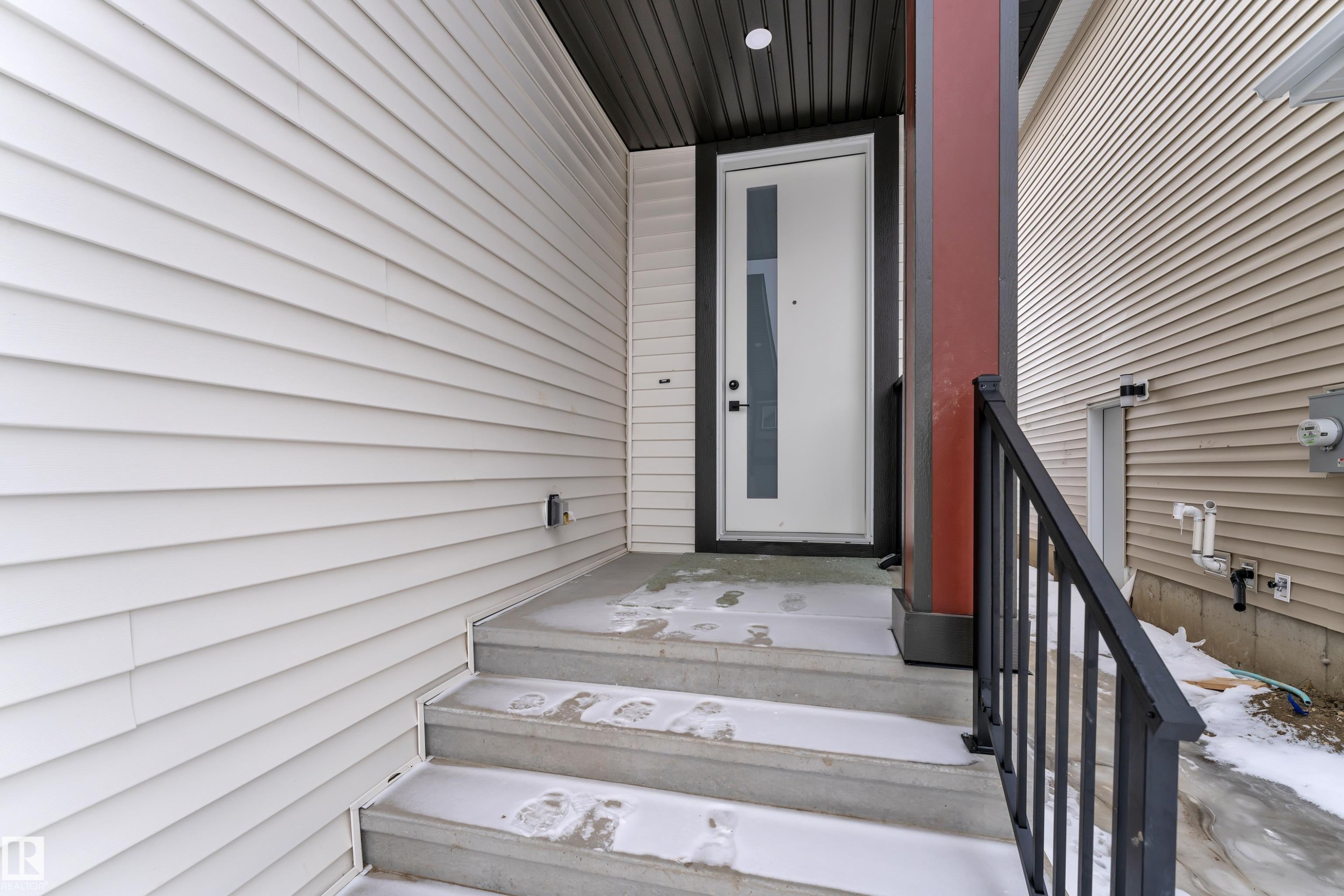 View of exterior entry - 741 Astoria Way, Devon, AB - Outdoor With Exterior