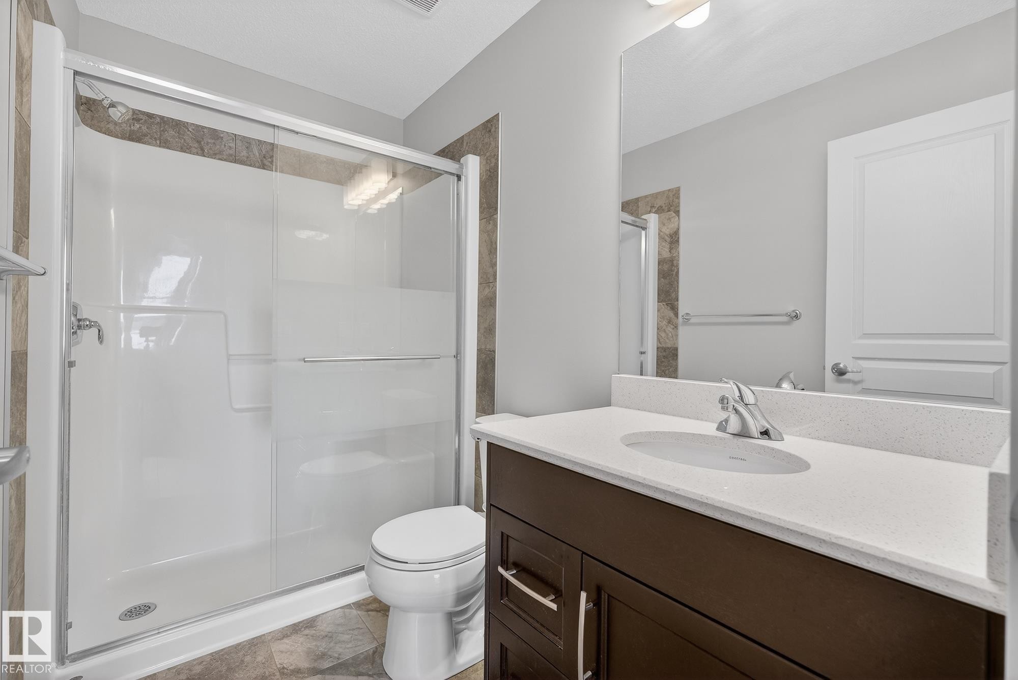 Bathroom with a shower stall and vanity - 206 812 Welsh Drive, Edmonton, AB - Indoor Photo Showing Bathroom