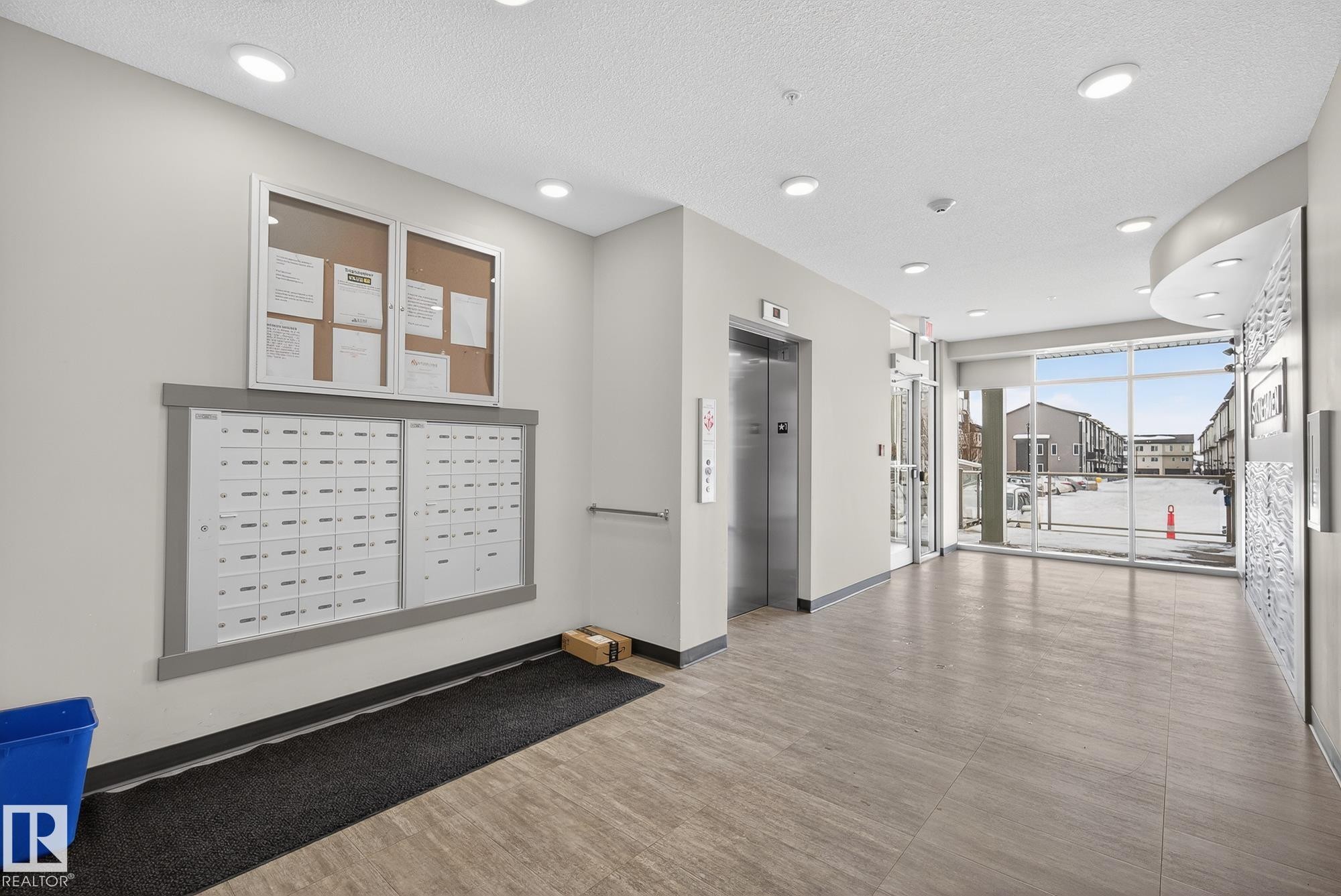 Common area featuring a textured ceiling and recessed lighting - 206 812 Welsh Drive, Edmonton, AB - Indoor Photo Showing Other Room