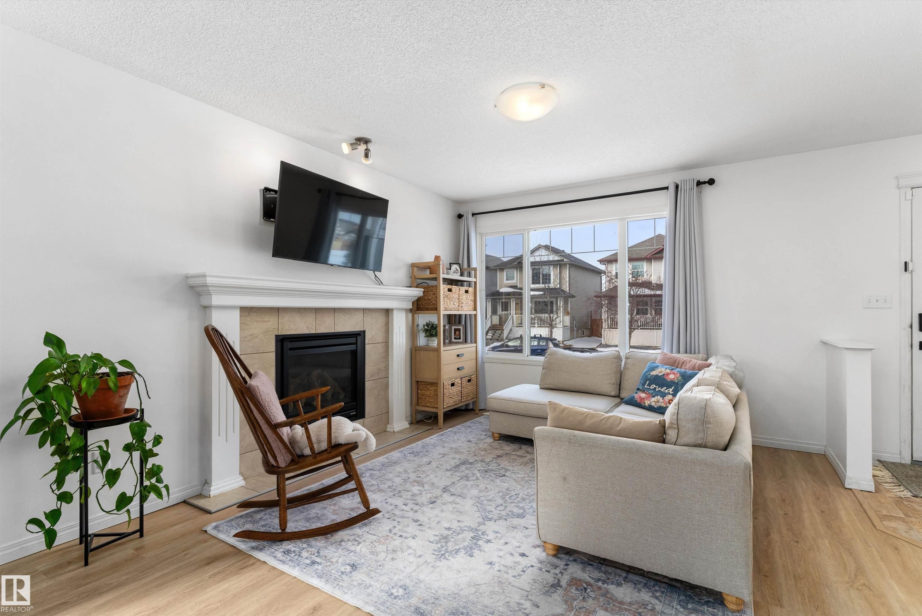 419 Songhurst Place, Leduc, AB - Indoor Photo Showing Living Room With Fireplace