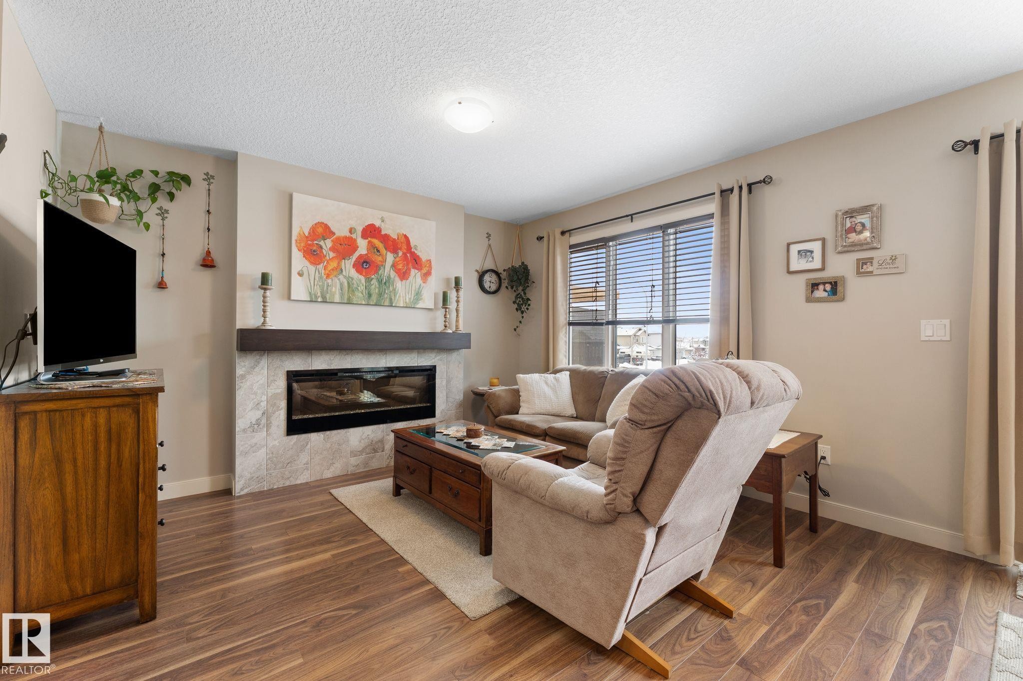 5 Hammett Gate, Spruce Grove, AB - Indoor Photo Showing Living Room With Fireplace