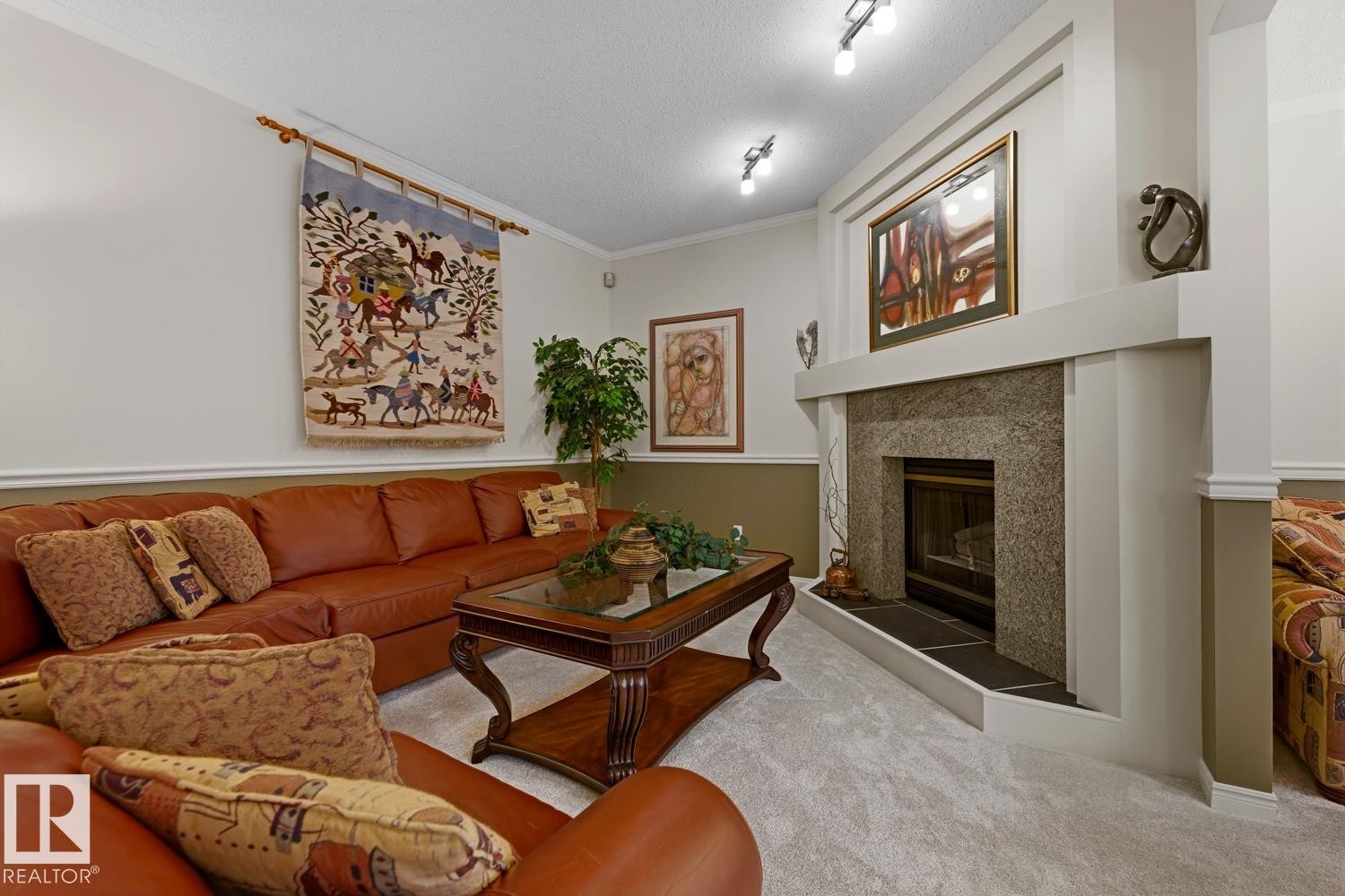 324 Wolf Ridge Point(E), Edmonton, AB - Indoor Photo Showing Living Room With Fireplace
