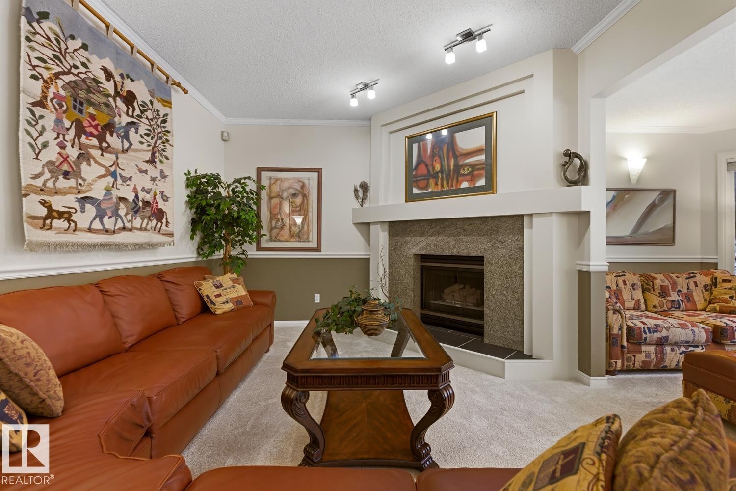 324 Wolf Ridge Point(E), Edmonton, AB - Indoor Photo Showing Living Room With Fireplace