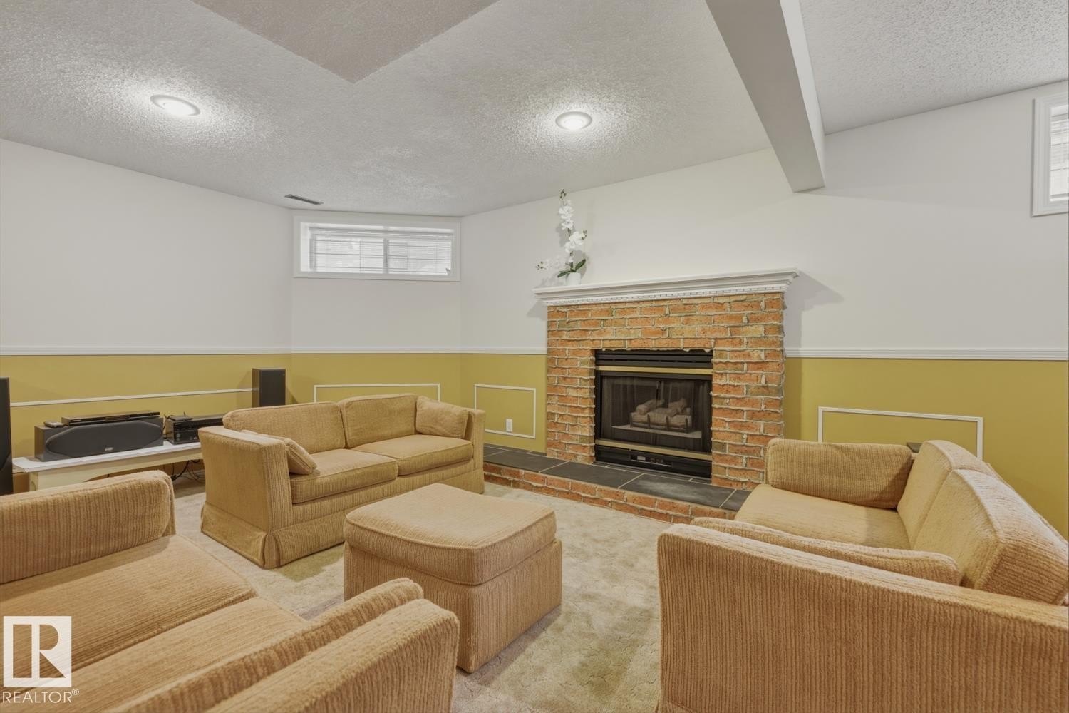 324 Wolf Ridge Point(E), Edmonton, AB - Indoor Photo Showing Living Room With Fireplace