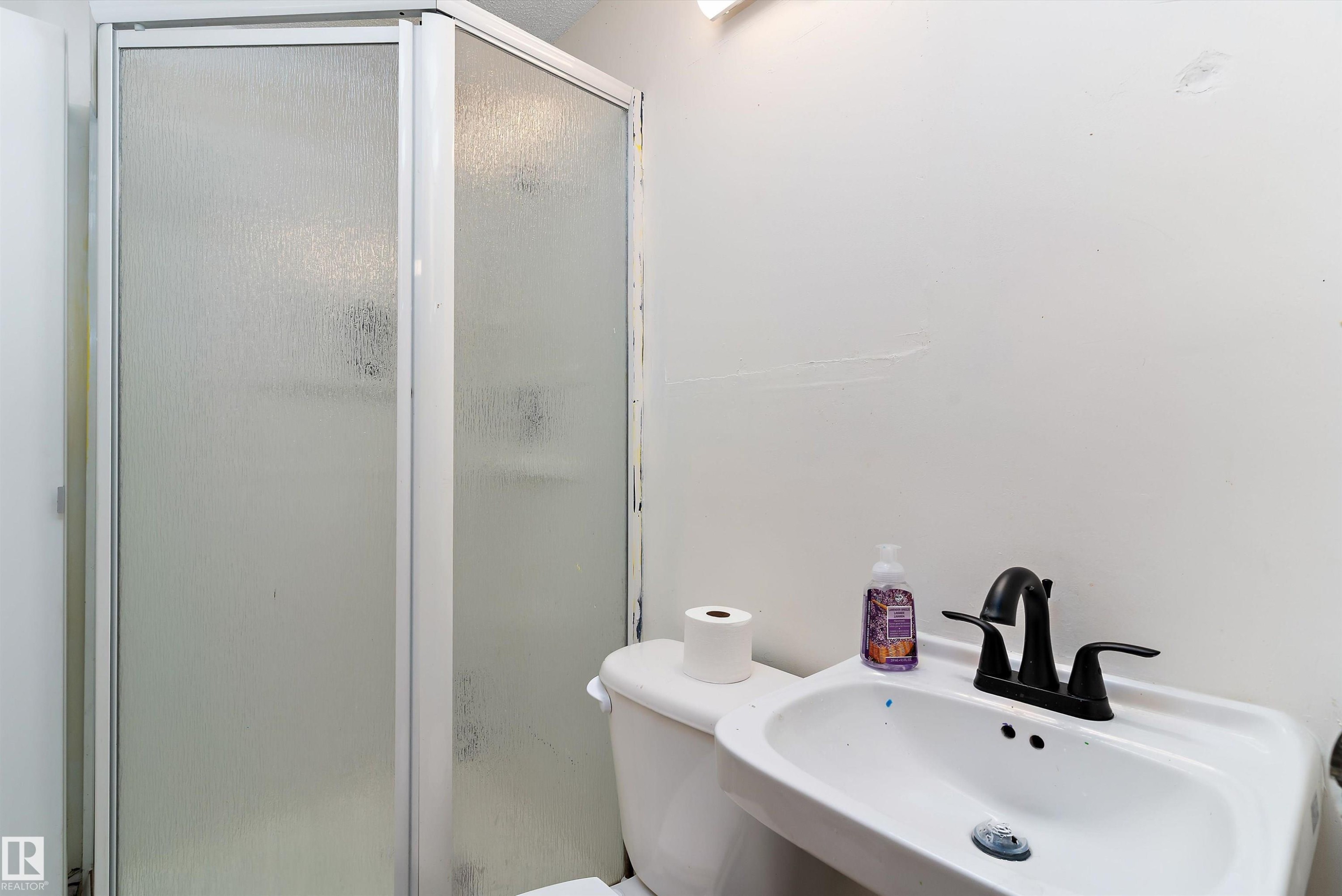 Full bathroom with a sink and a stall shower - 115 Walker Road, Edmonton, AB - Indoor Photo Showing Bathroom