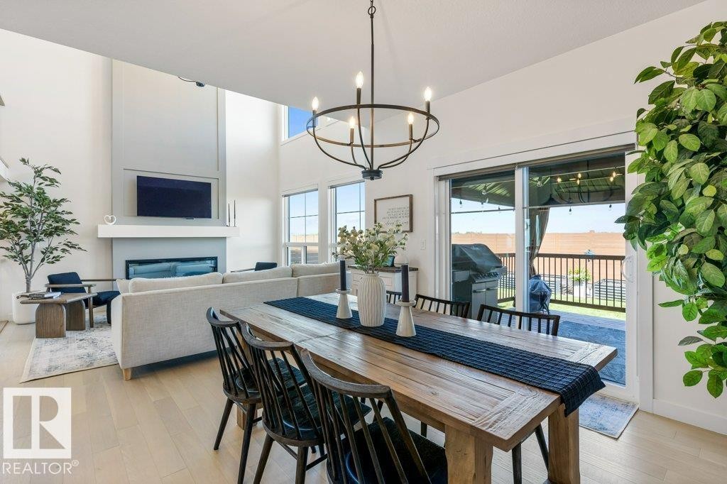 65 Jubilation Drive, St. Albert, AB - Indoor Photo Showing Dining Room With Fireplace