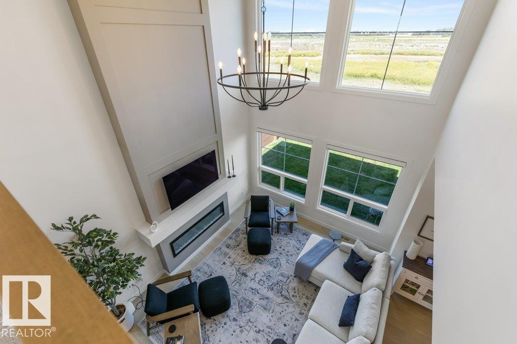 65 Jubilation Drive, St. Albert, AB - Indoor Photo Showing Other Room With Fireplace