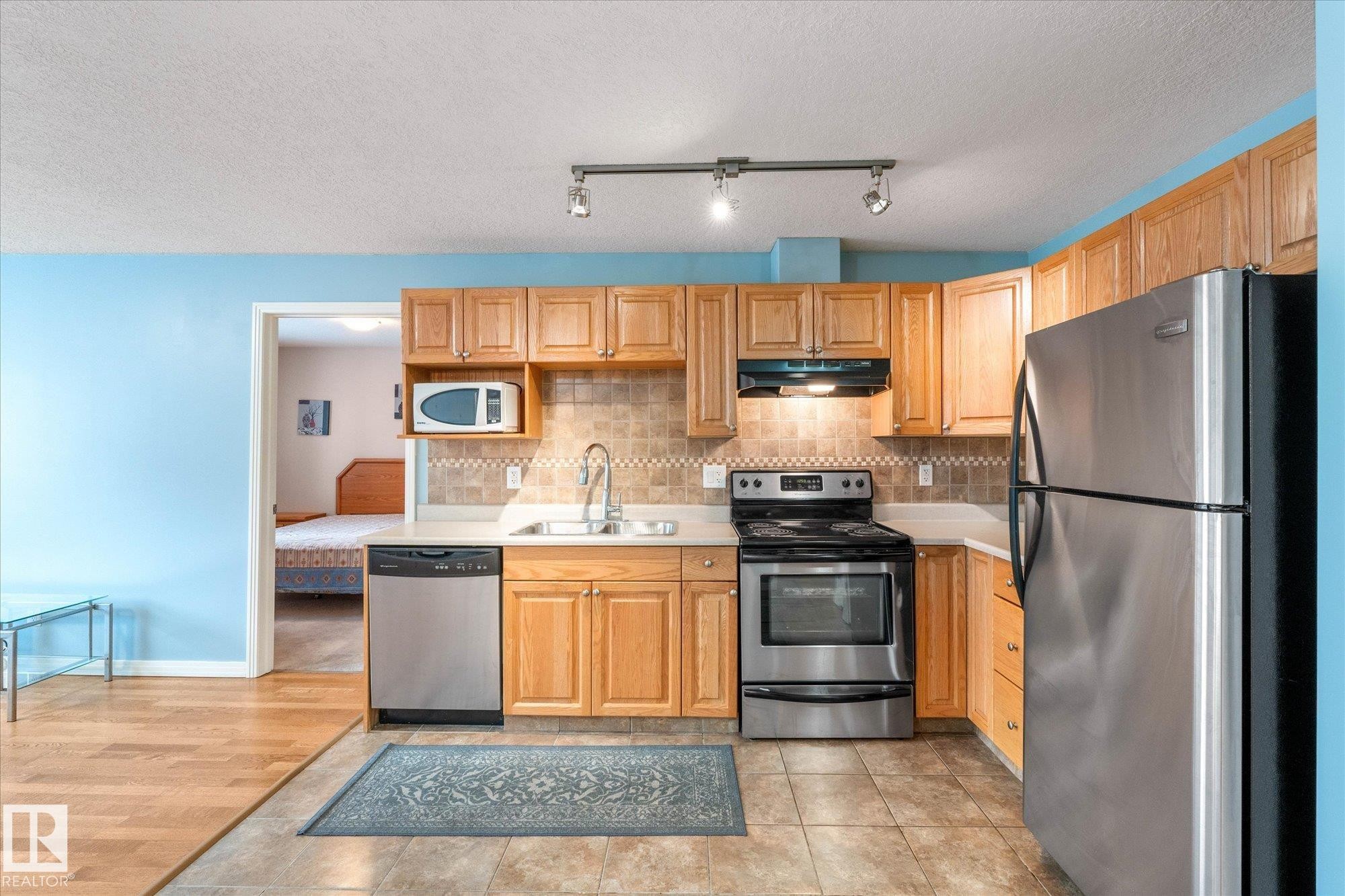 117 5005 165 Avenue, Edmonton, AB - Indoor Photo Showing Kitchen With Double Sink