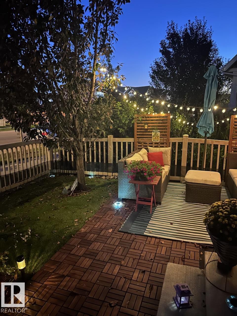 Wooden terrace featuring an outdoor lounge area and area for grilling - 14 1140 Chappelle Boulevard, Edmonton, AB - Outdoor With Deck Patio Veranda