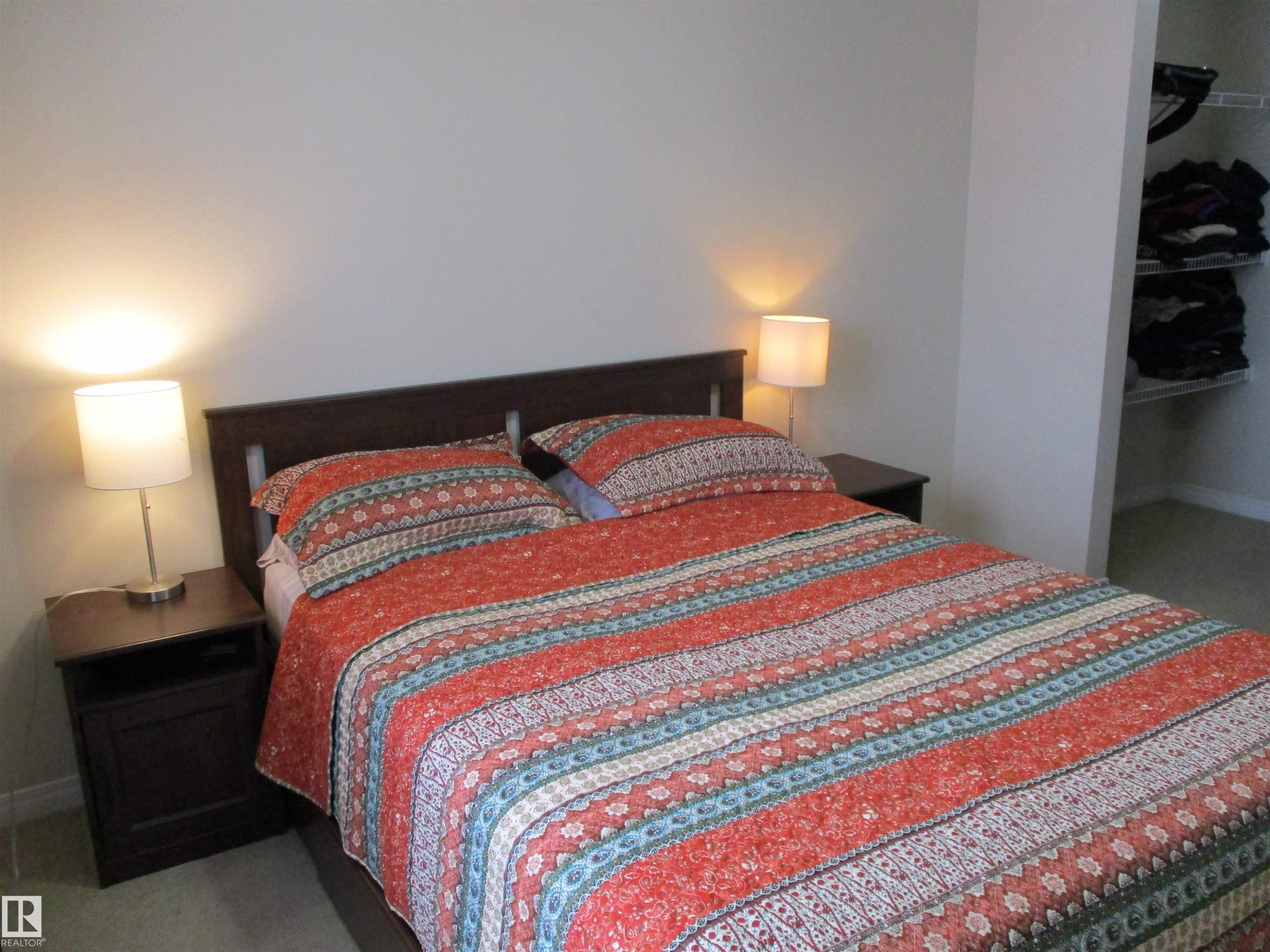 Bedroom featuring light colored carpet and a closet - 3309 9351 Simpson Drive, Edmonton, AB - Indoor Photo Showing Bedroom