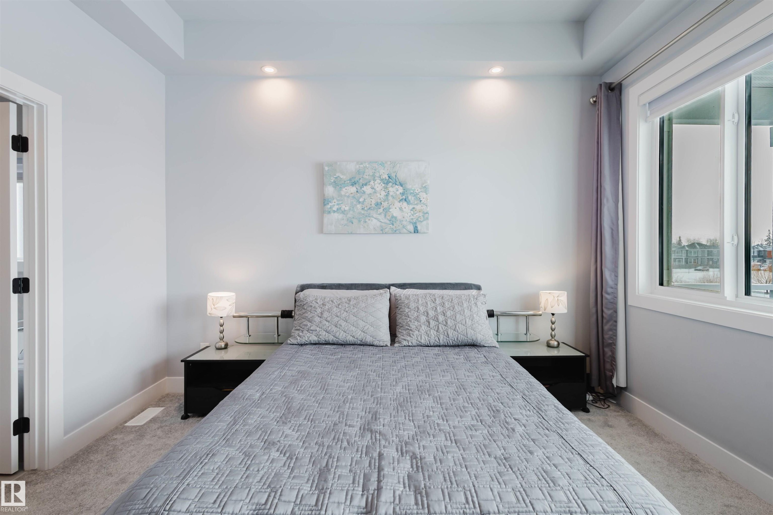 Bedroom with light colored carpet and recessed lighting - 16217 32 Avenue, Edmonton, AB - Indoor Photo Showing Bedroom