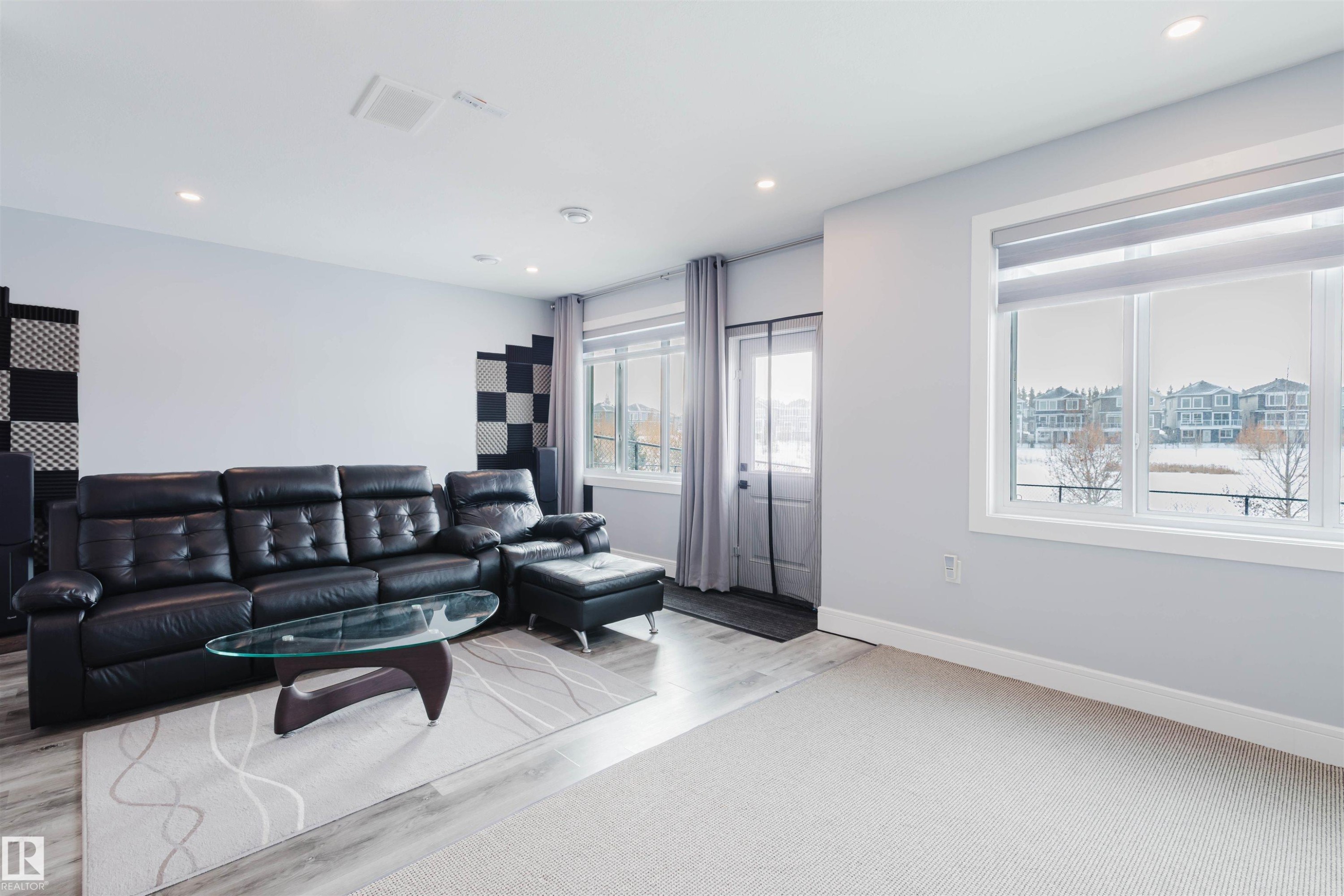 Living room with recessed lighting and light wood finished floors - 16217 32 Avenue, Edmonton, AB - Indoor Photo Showing Living Room
