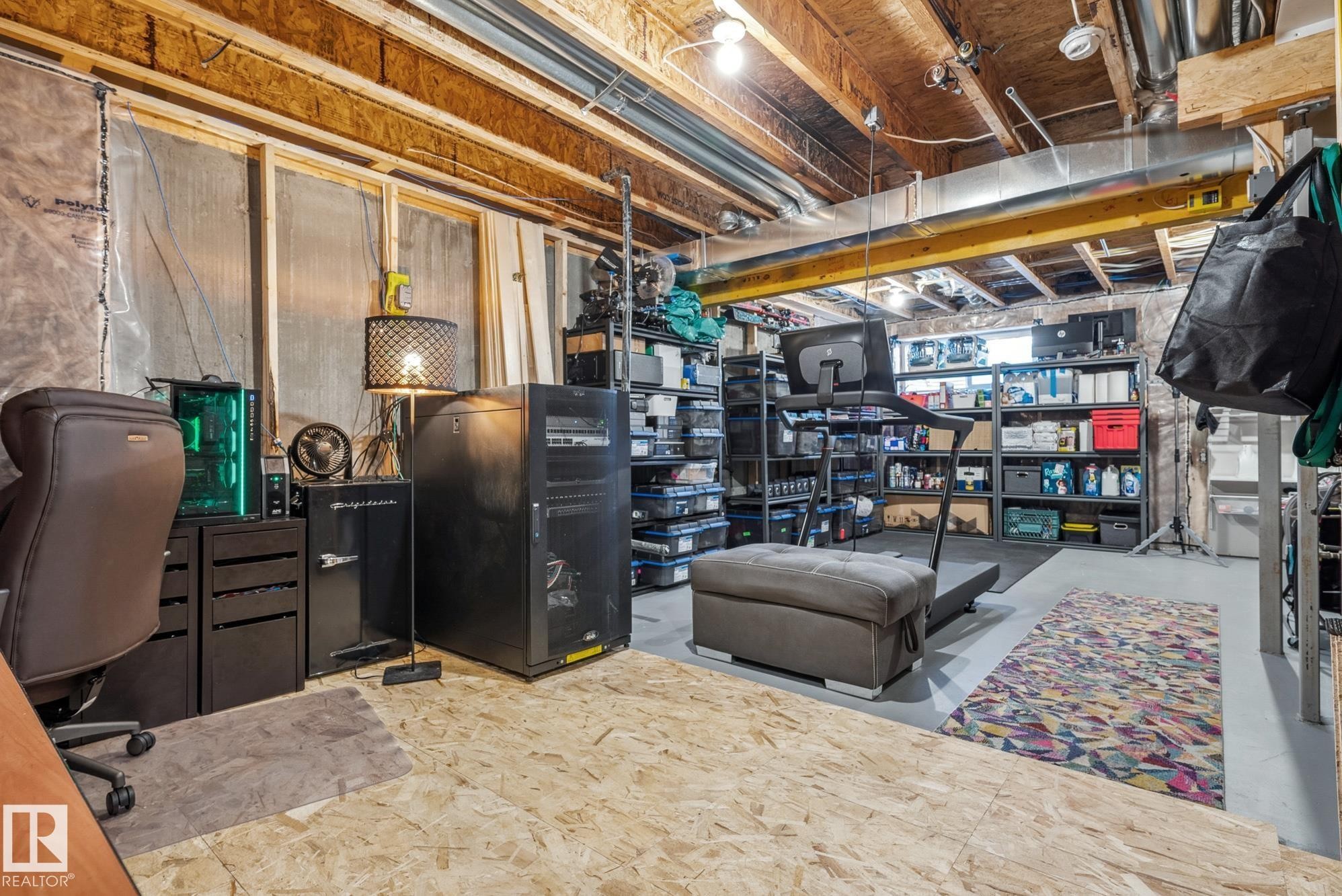 Unfinished basement with a desk - 76 330 Bulyea Road, Edmonton, AB - Indoor Photo Showing Basement