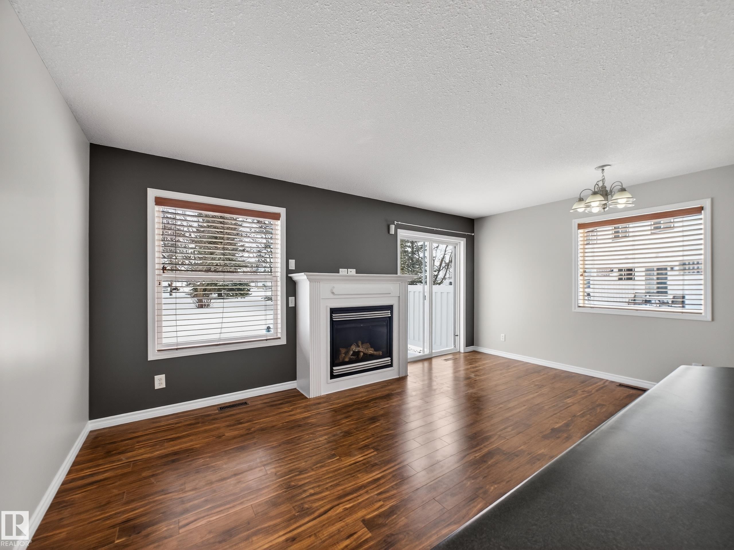 138 16823 84 Street, Edmonton, AB - Indoor Photo Showing Living Room With Fireplace