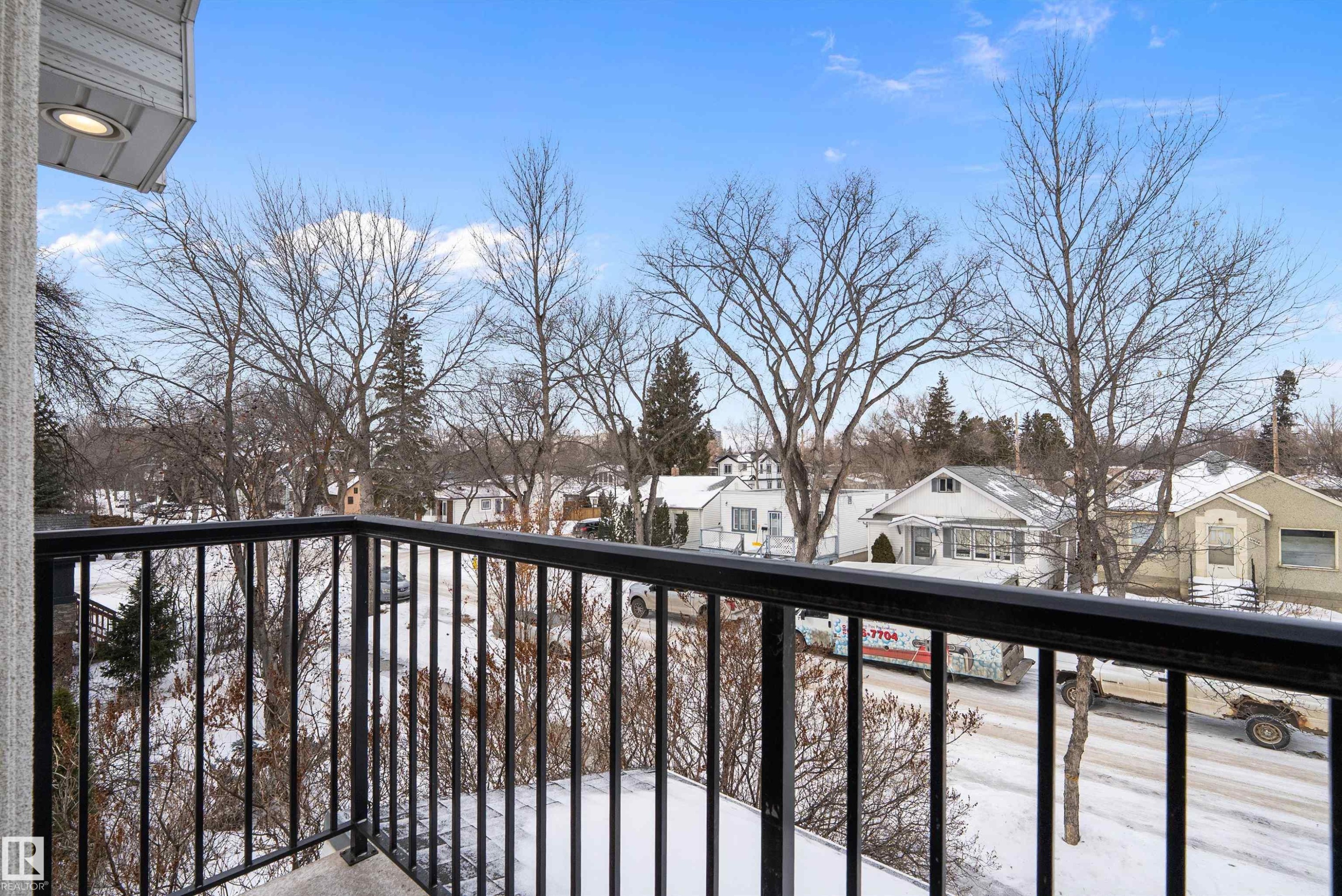 Snow covered back of property with a residential view - 10623 75 Avenue, Edmonton, AB - Outdoor