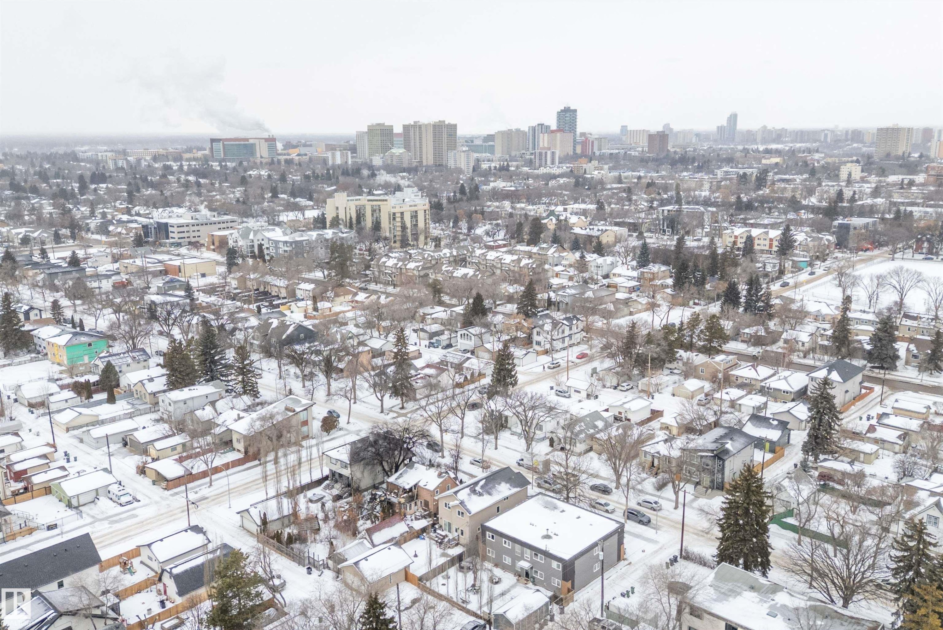 Snowy aerial view featuring a city view - 10623 75 Avenue, Edmonton, AB - Outdoor With View
