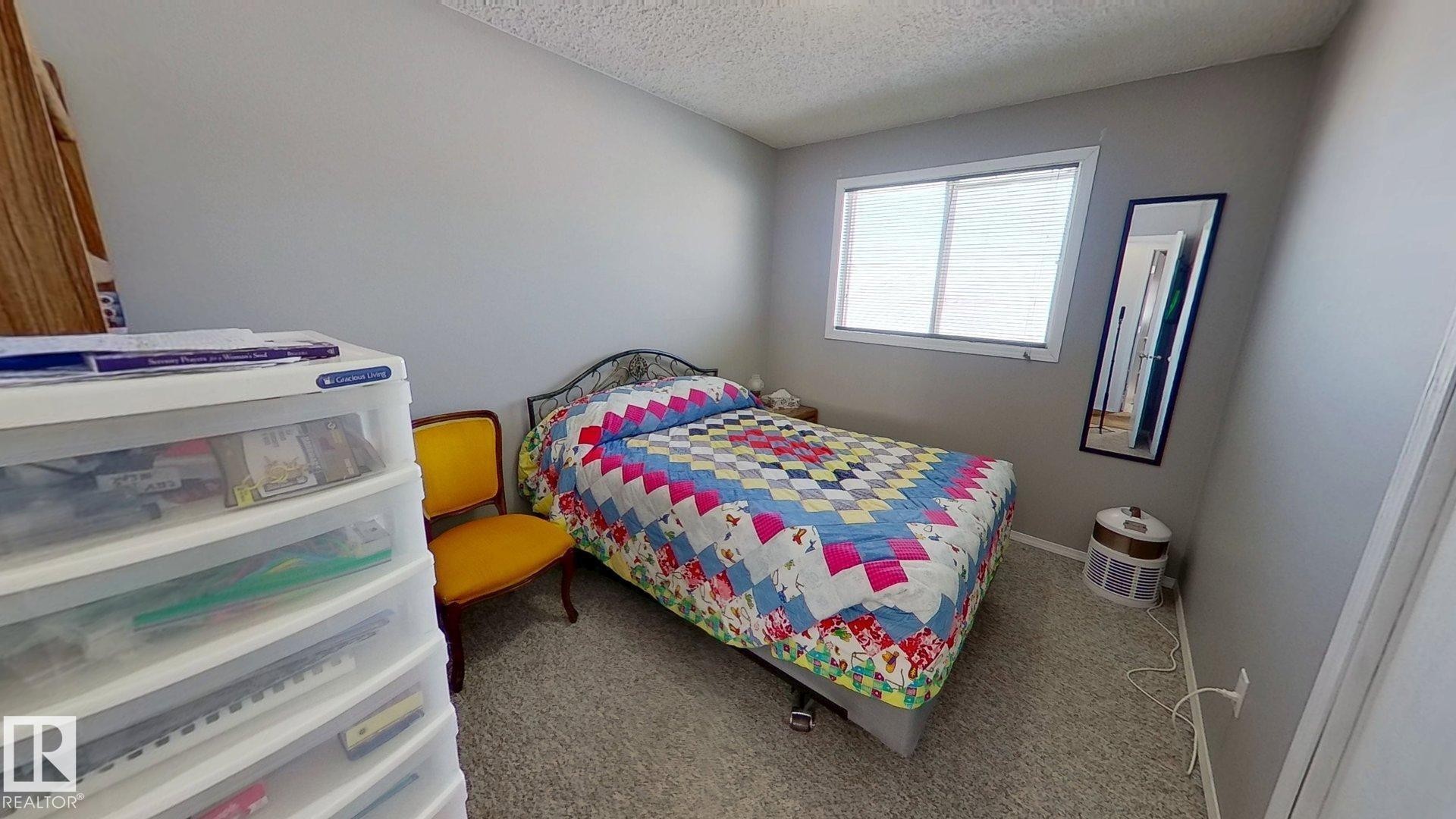 5307 Willow Drive, Boyle, AB - Indoor Photo Showing Bedroom