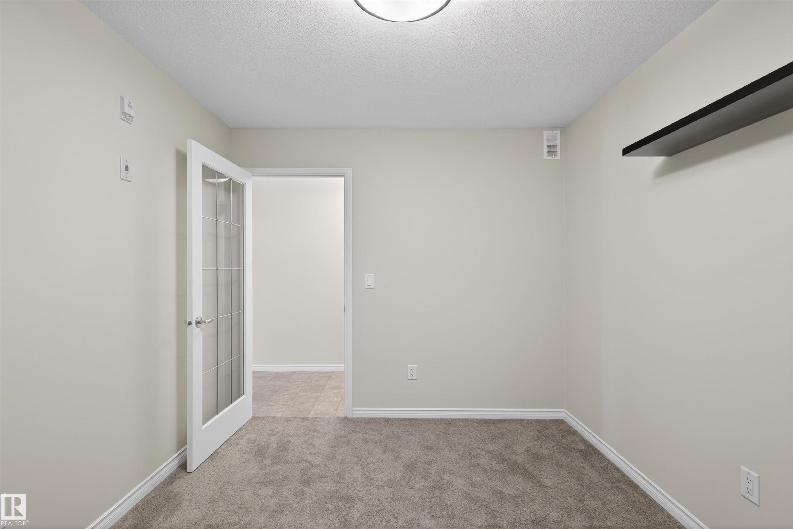 102 1589 Glastonbury Boulevard, Edmonton, AB - Indoor Photo Showing Other Room