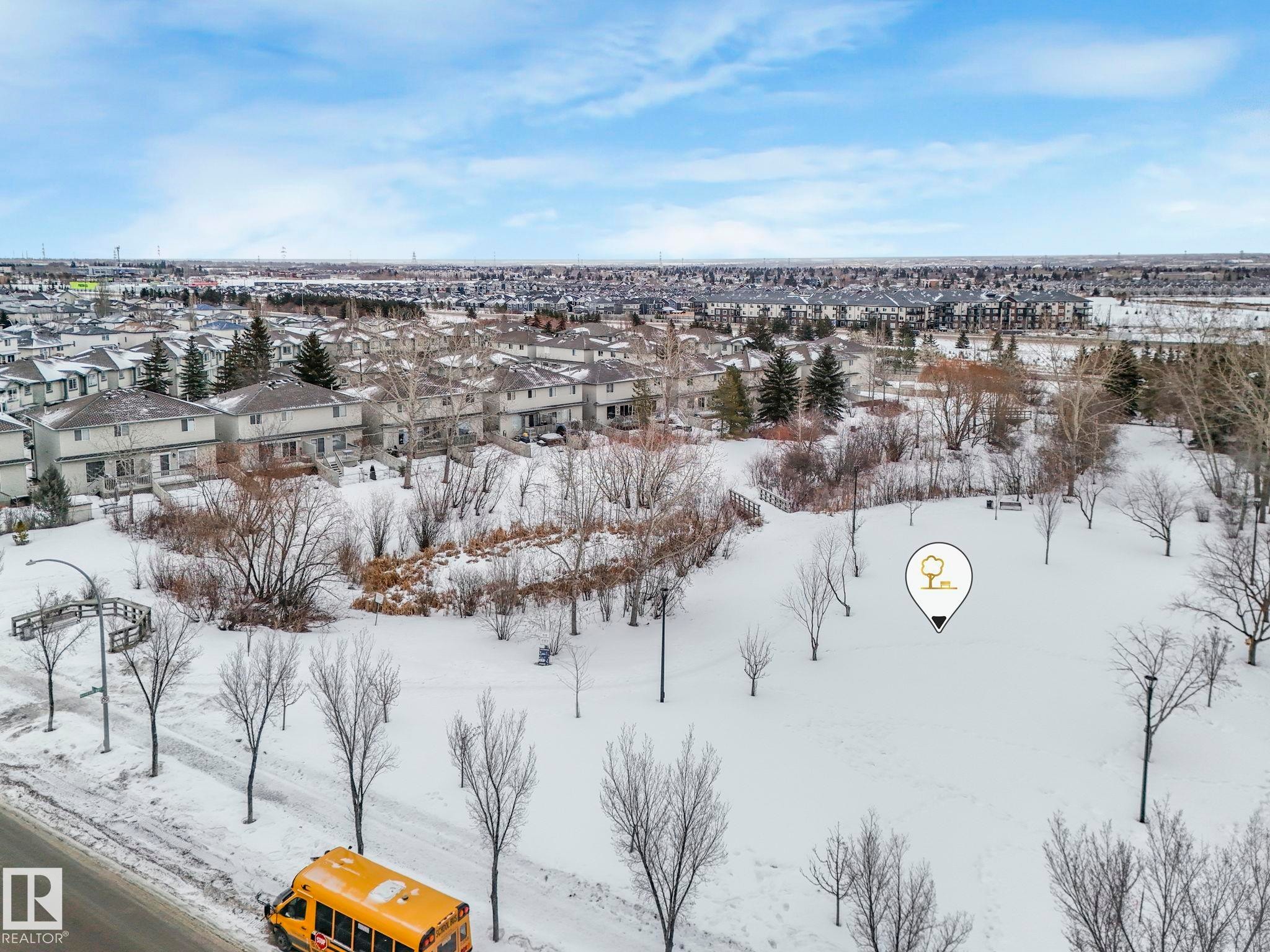 Snowy aerial view with a residential view - 4720 150 Avenue, Edmonton, AB - Outdoor With View