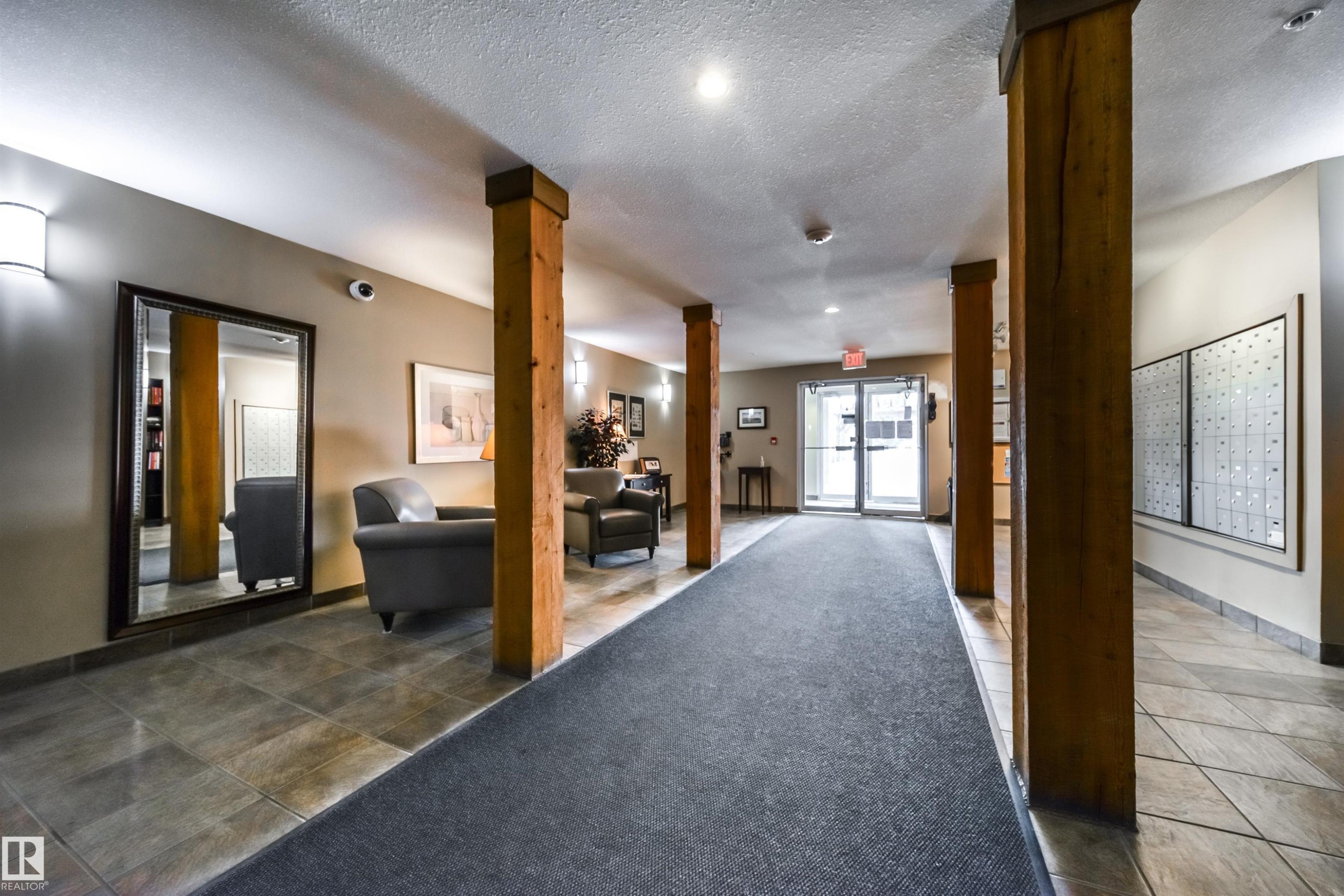 Lobby featuring a textured ceiling and recessed lighting - 237 278 Suder Greens Drive, Edmonton, AB - Indoor Photo Showing Other Room