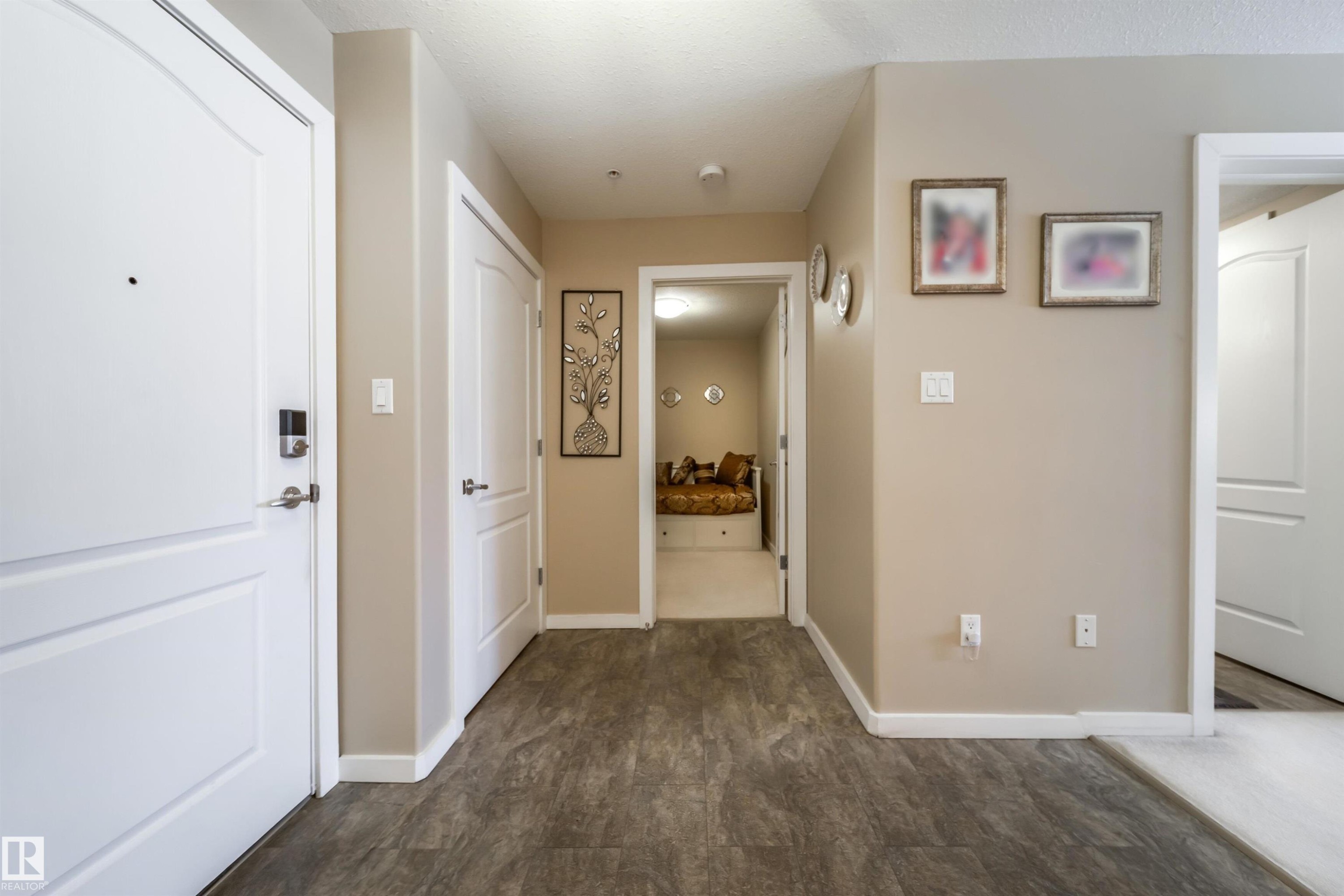 Hallway featuring baseboards - 237 278 Suder Greens Drive, Edmonton, AB - Indoor Photo Showing Kitchen