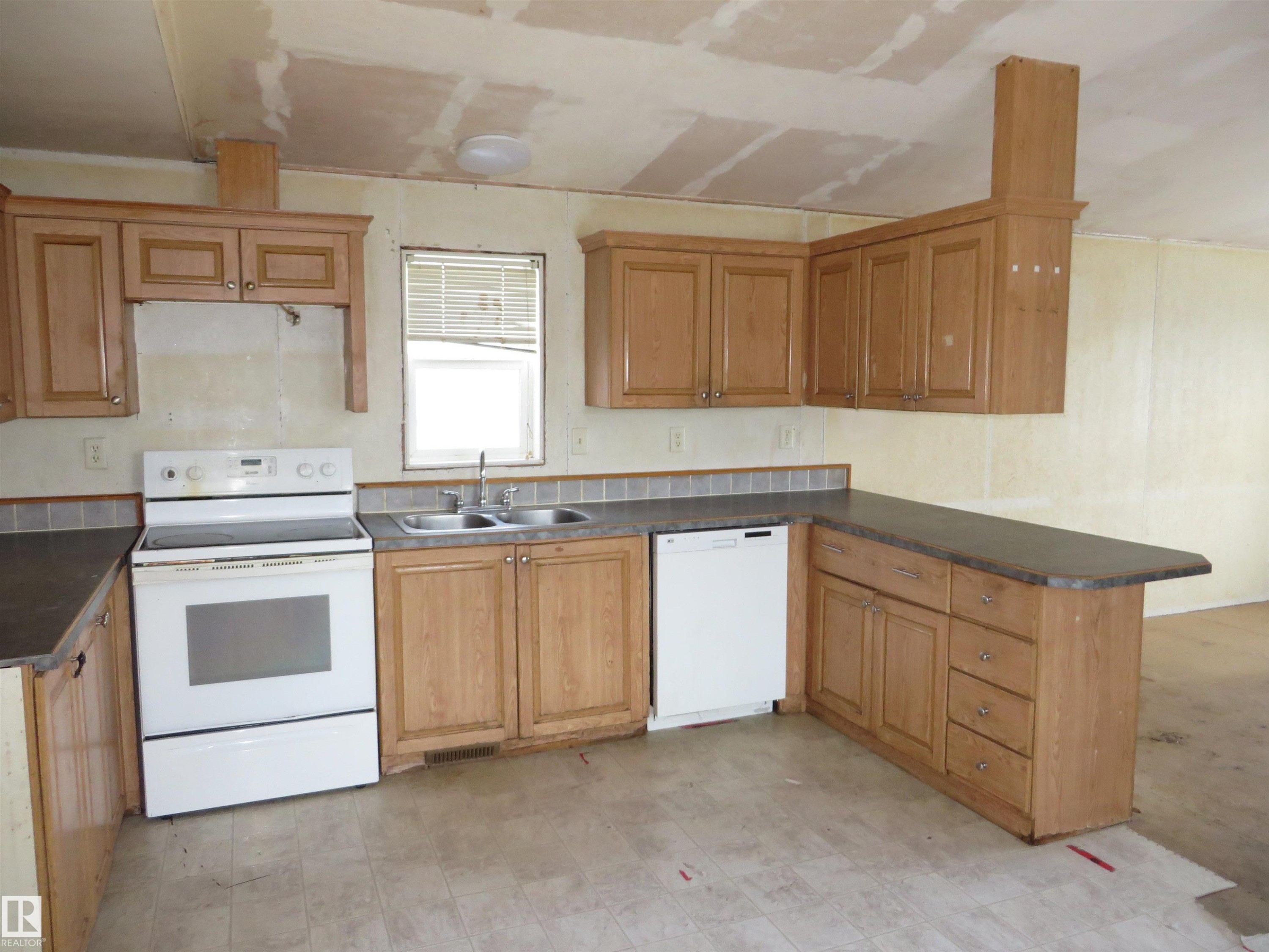 53 Willow Park Estates, Leduc, AB - Indoor Photo Showing Kitchen With Double Sink