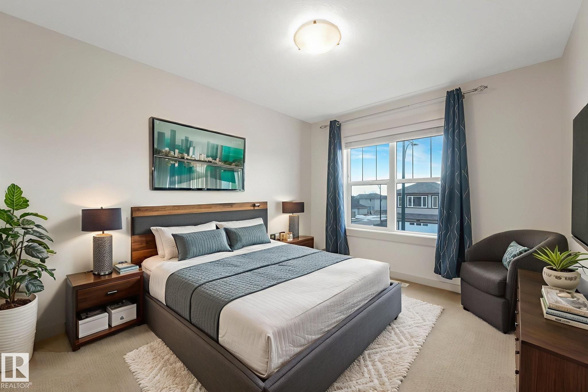 Bedroom with light colored carpet and baseboards - 1548 36 Avenue, Edmonton, AB - Indoor Photo Showing Bedroom