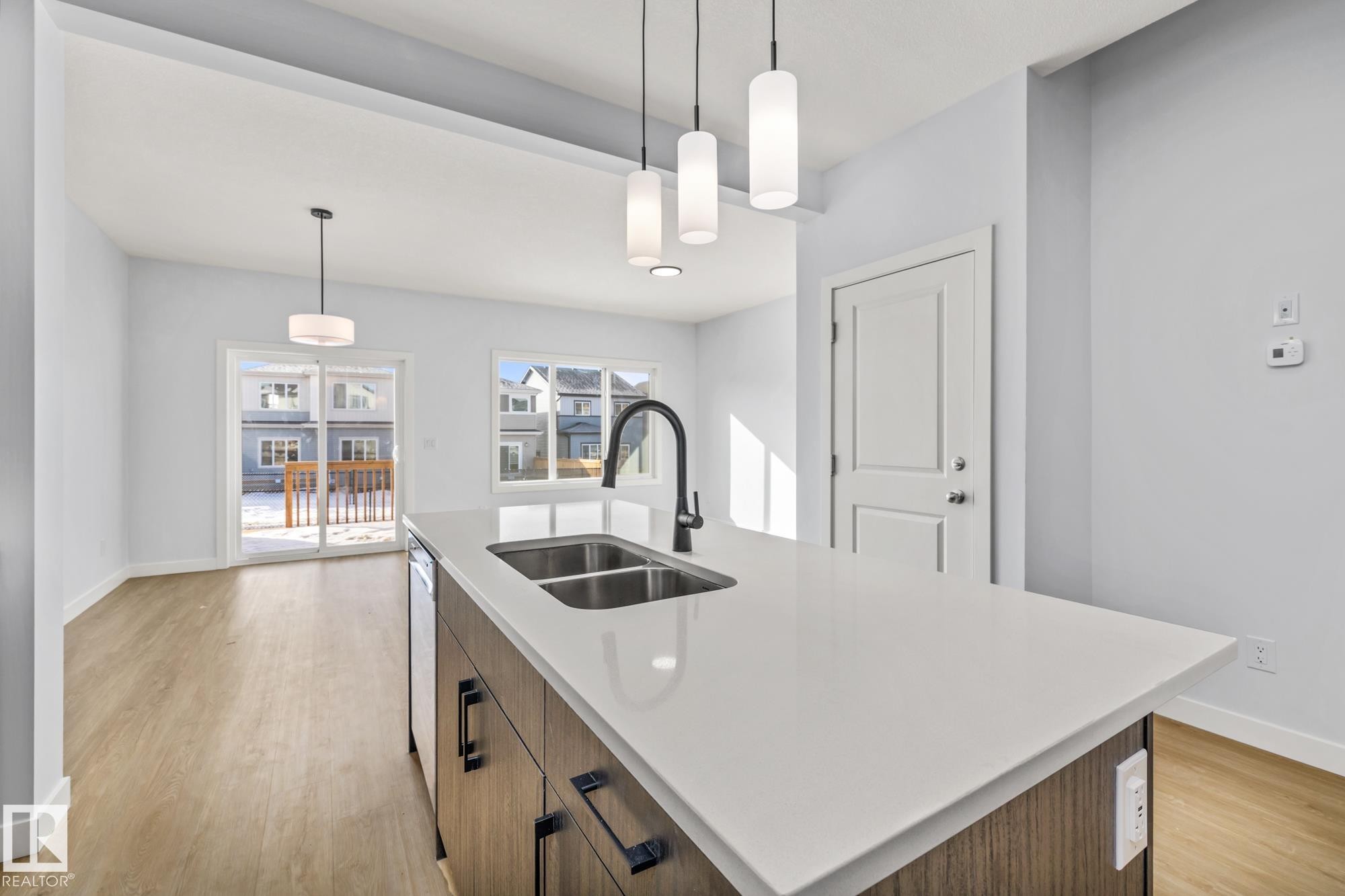 110 Honeysuckle Green, Leduc, AB - Indoor Photo Showing Kitchen With Double Sink