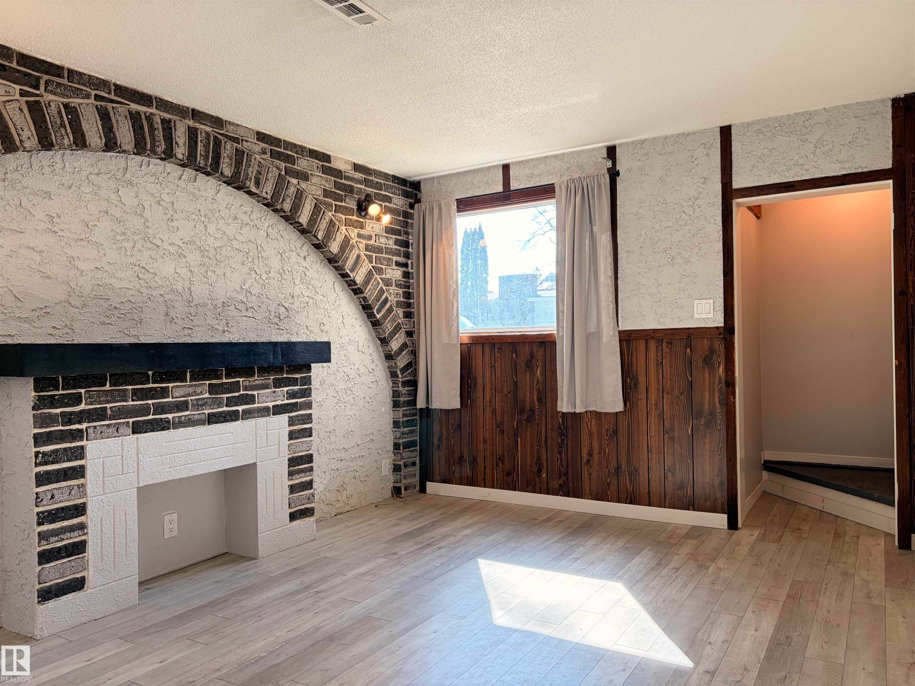 9848 87 Avenue, Edmonton, AB - Indoor Photo Showing Other Room With Fireplace