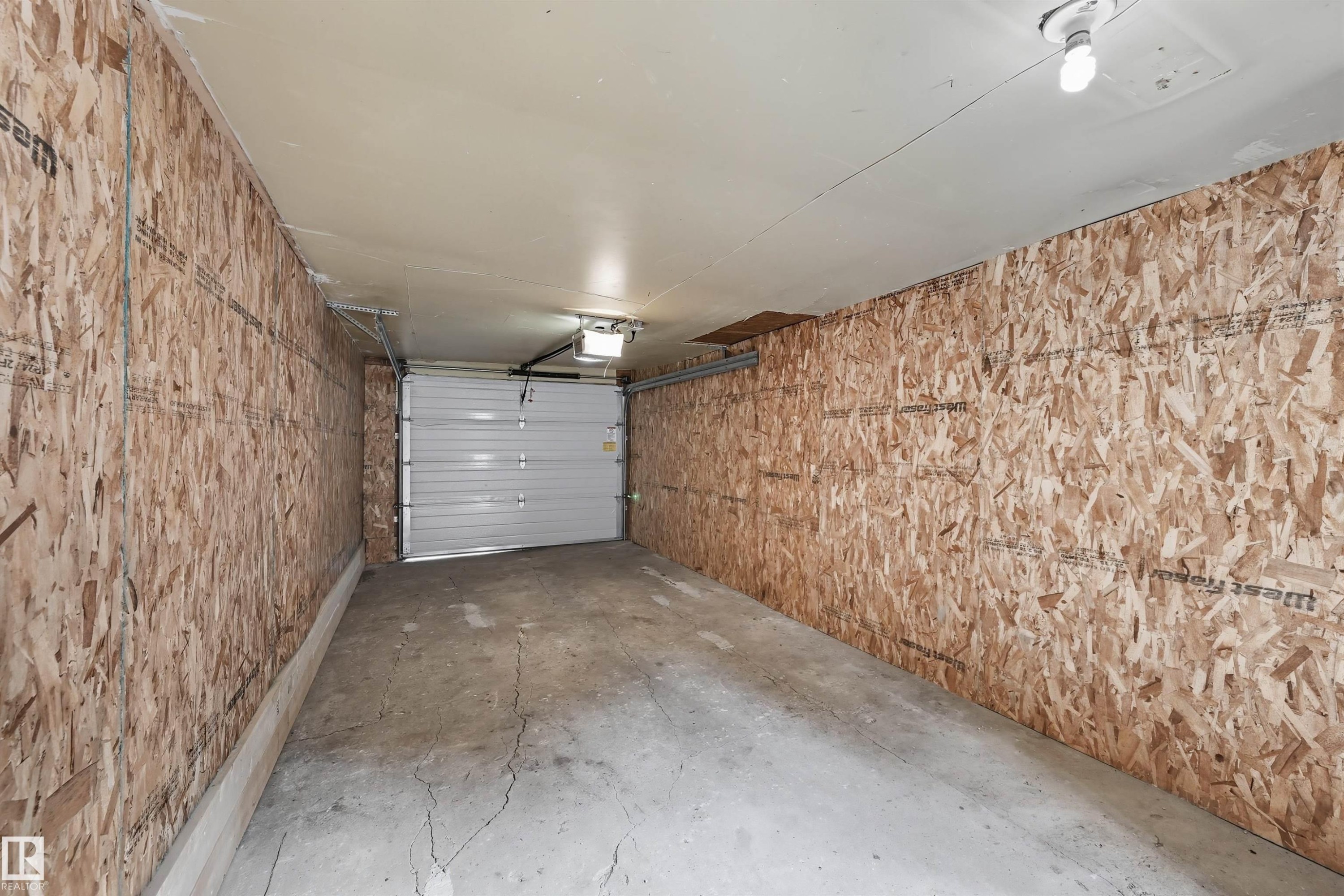 9848 87 Avenue, Edmonton, AB - Indoor Photo Showing Garage