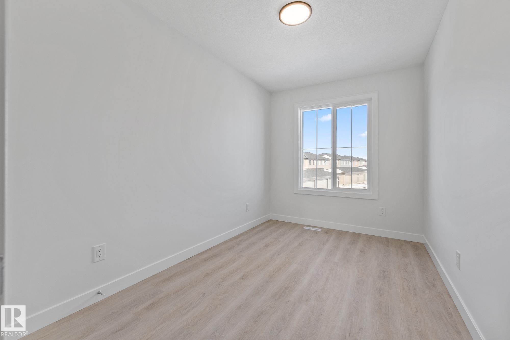 112 Honeysuckle Green, Leduc, AB - Indoor Photo Showing Other Room