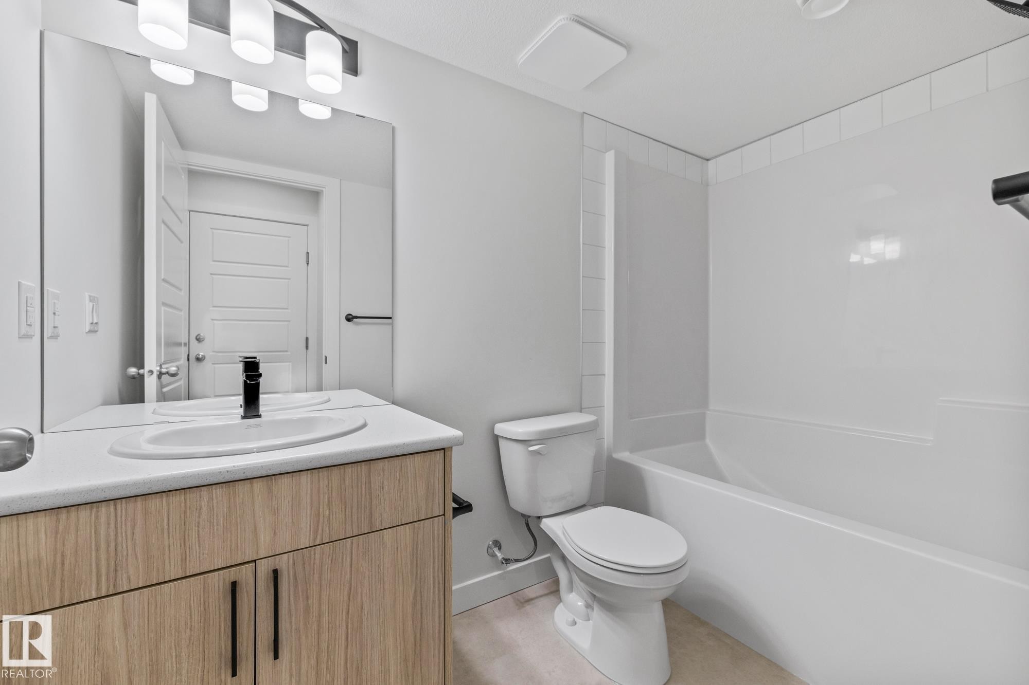 112 Honeysuckle Green, Leduc, AB - Indoor Photo Showing Bathroom