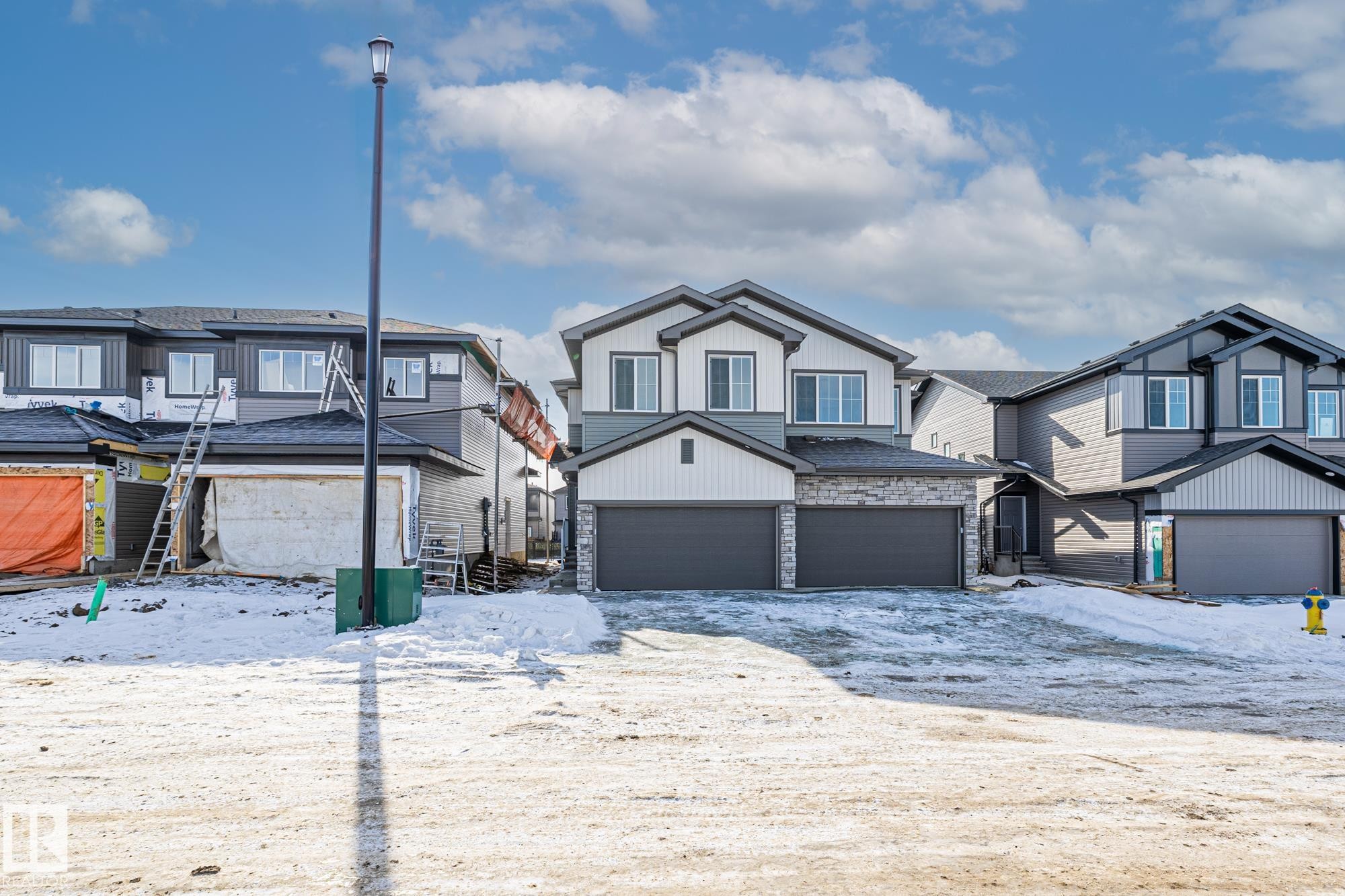 112 Honeysuckle Green, Leduc, AB - Outdoor With Facade