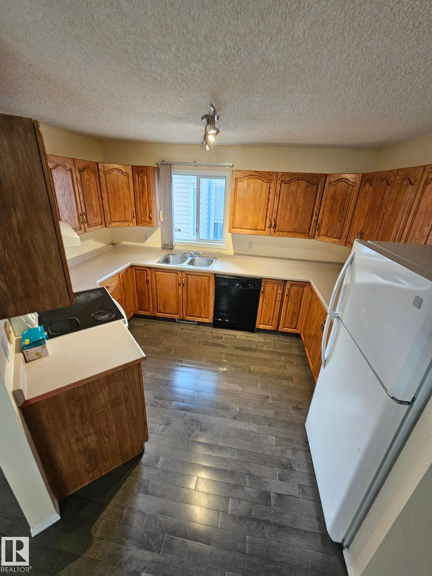 Edmonton, AB - Indoor Photo Showing Kitchen With Double Sink
