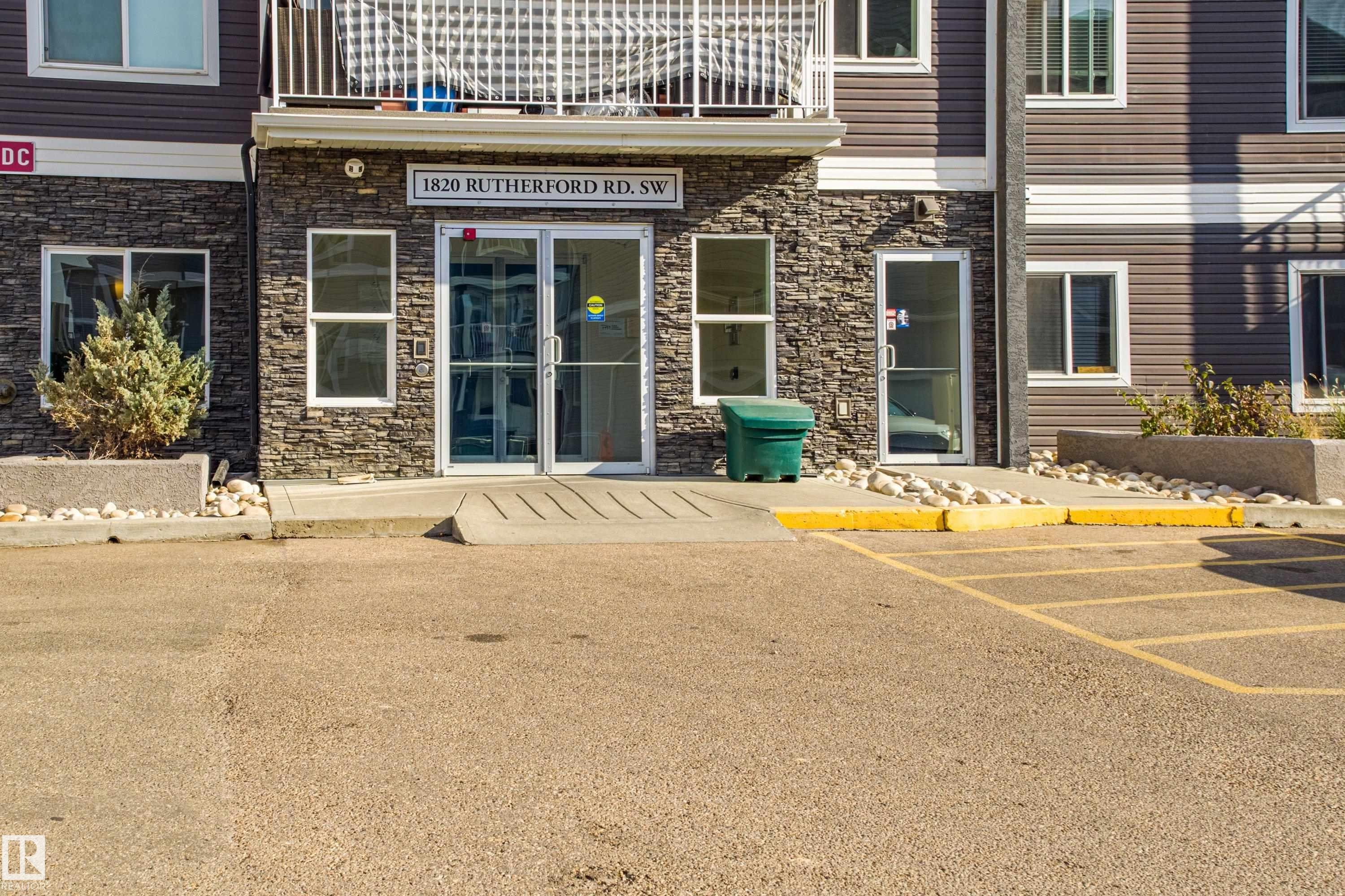 211 1820 Rutherford Road, Edmonton, AB - Outdoor With Balcony With Facade