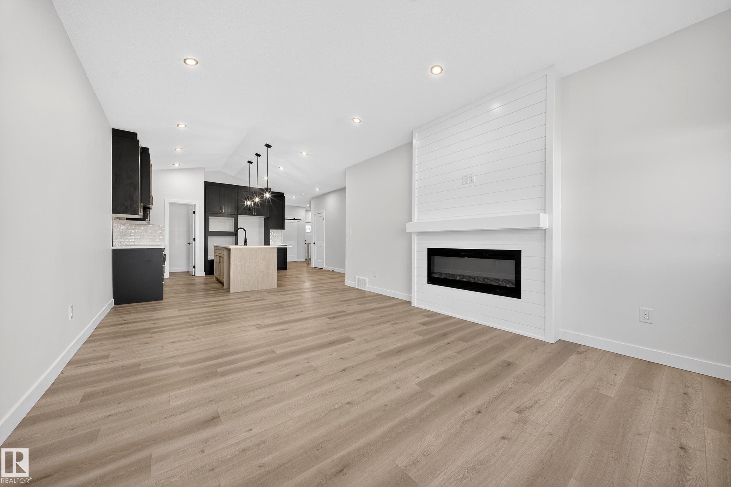 3325 Chickadee Drive, Edmonton, AB - Indoor Photo Showing Living Room With Fireplace