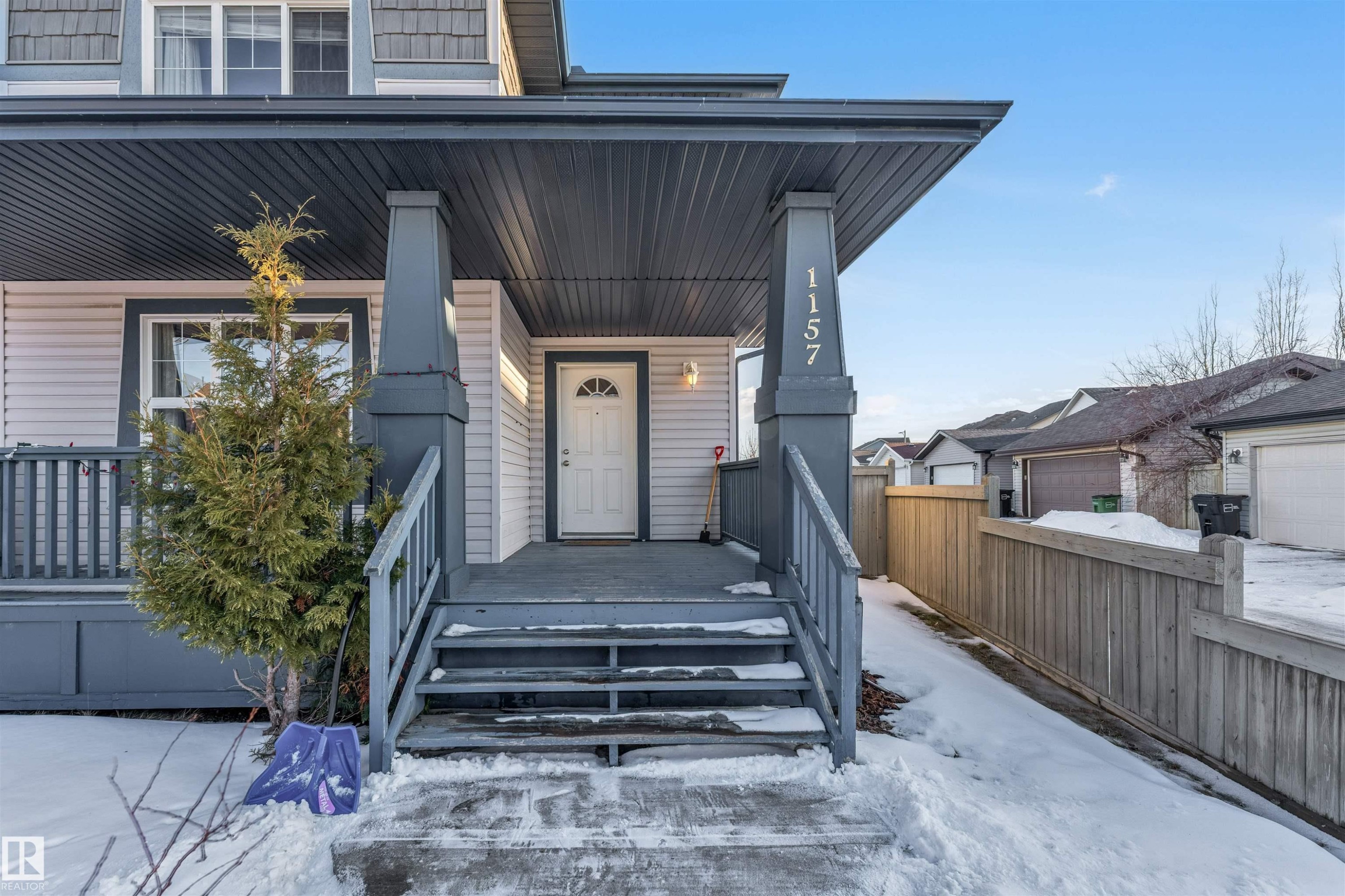 Property entrance featuring covered porch - 1157 37 Avenue, Edmonton, AB - Outdoor With Deck Patio Veranda