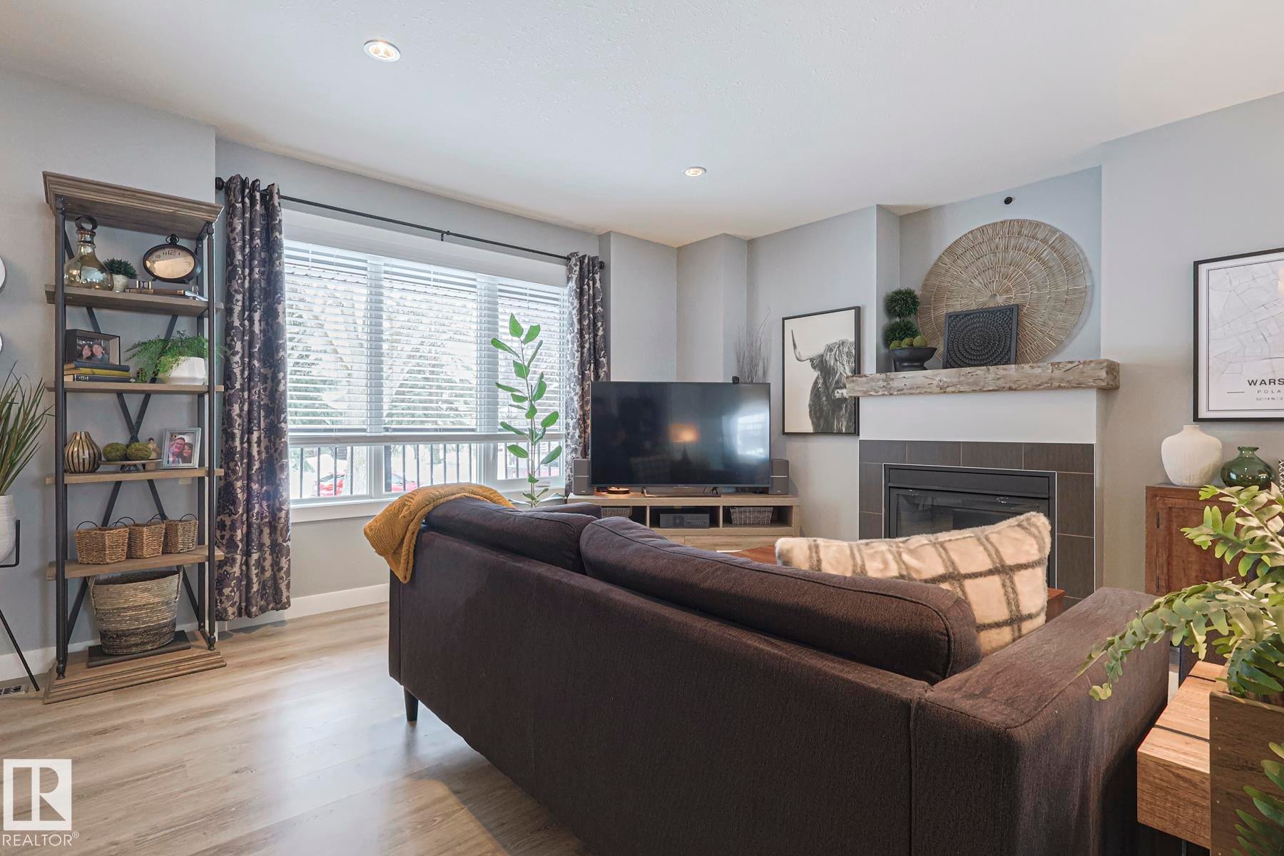 12209 103 Street, Edmonton, AB - Indoor Photo Showing Living Room With Fireplace