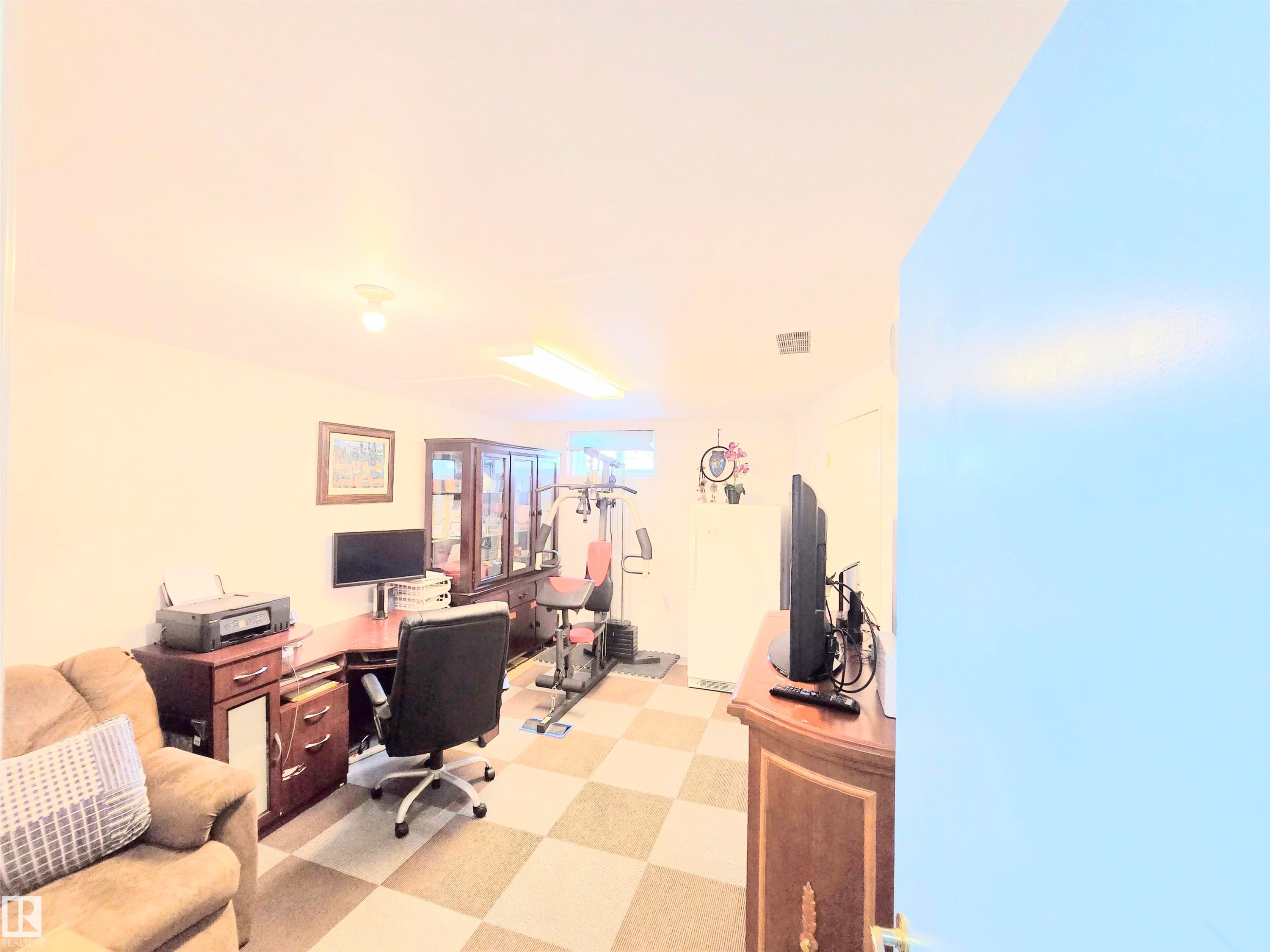 Office area with light floors - 80 Amberly Crest, Edmonton, AB - Indoor Photo Showing Office