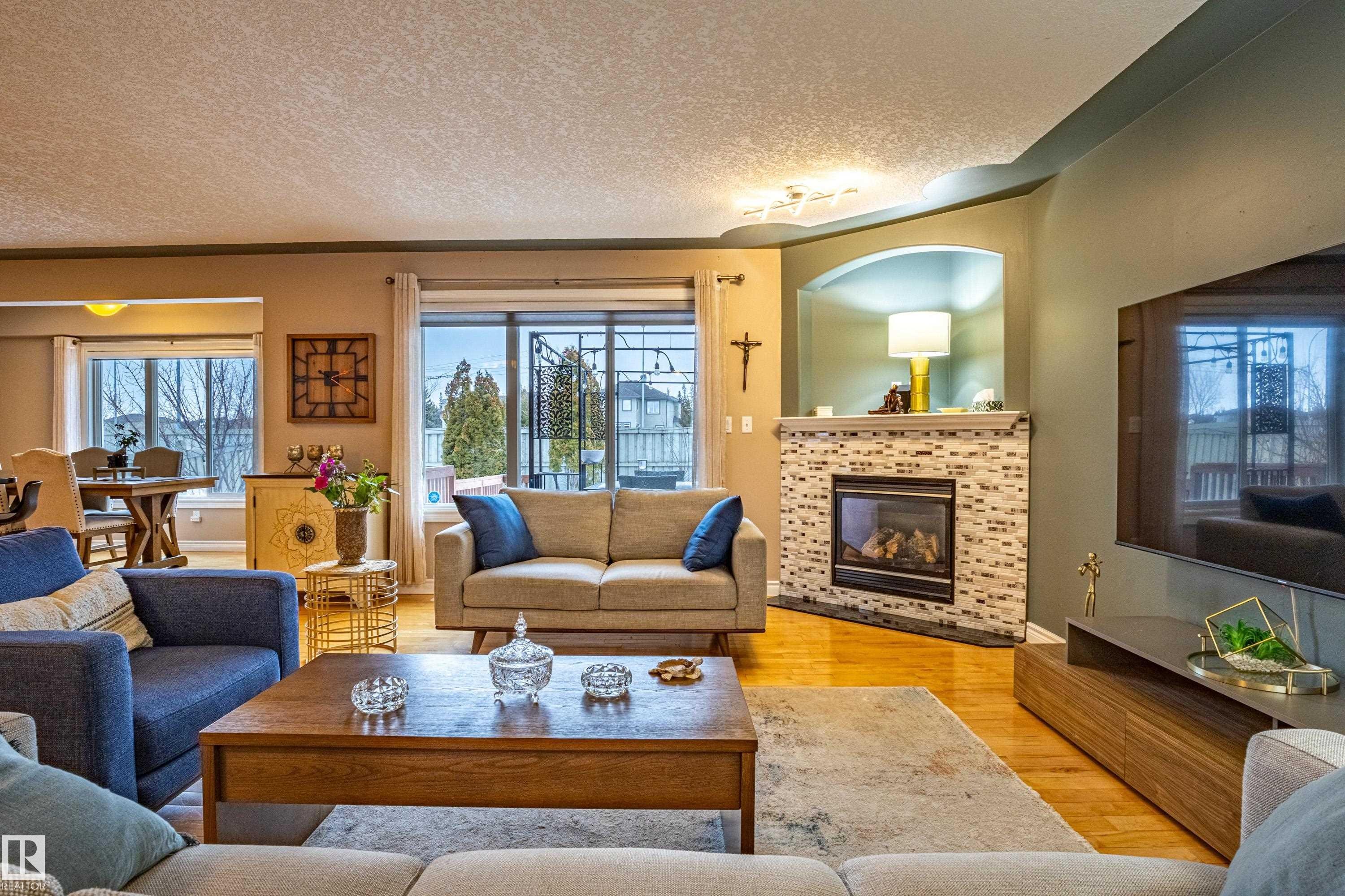 2721 Miles Place, Edmonton, AB - Indoor Photo Showing Living Room With Fireplace