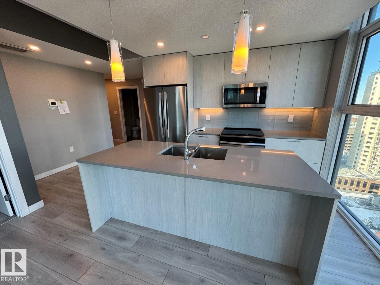 2103 10180 103 Street, Edmonton, AB - Indoor Photo Showing Kitchen With Double Sink