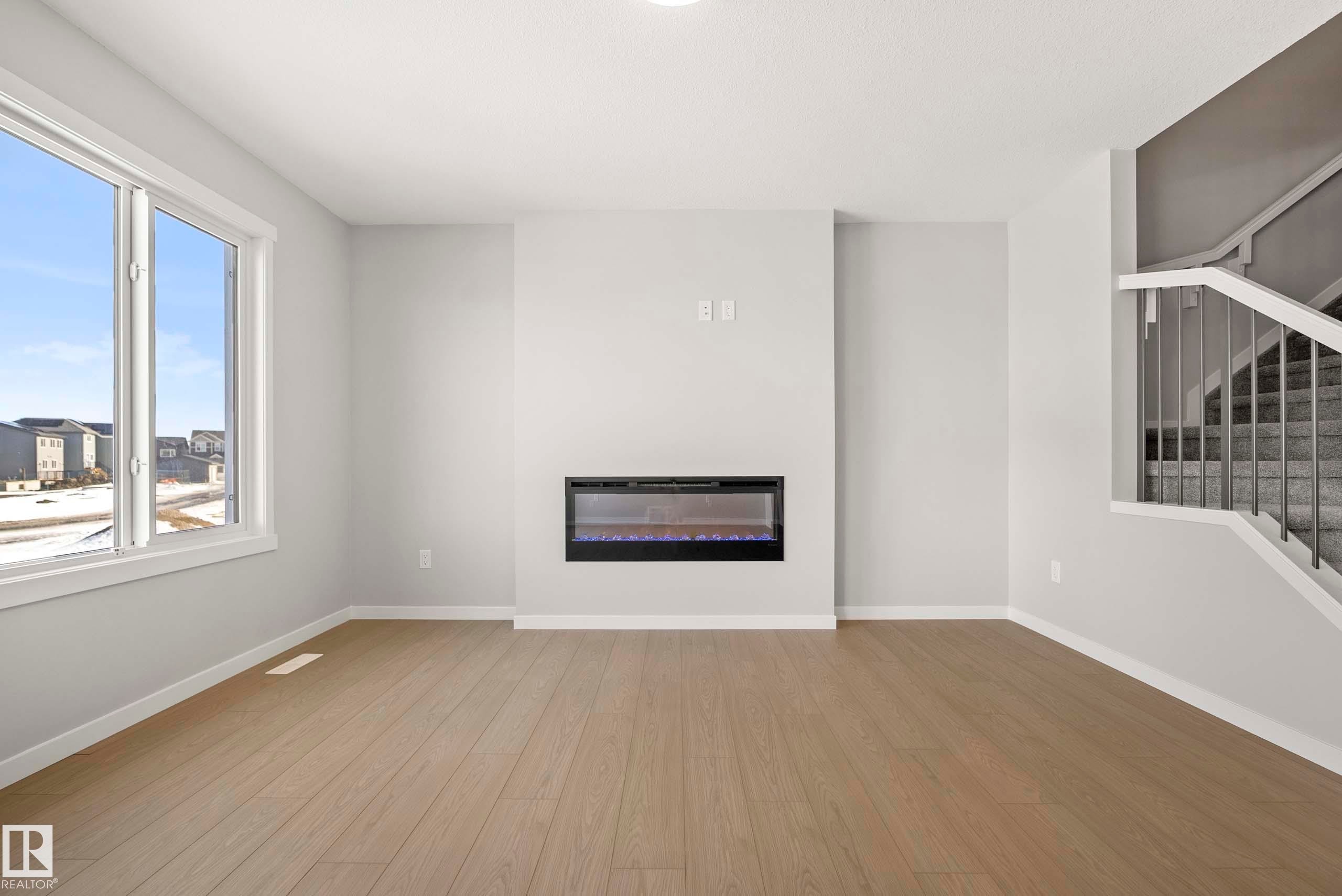 342 172 Avenue, Edmonton, AB - Indoor Photo Showing Other Room With Fireplace